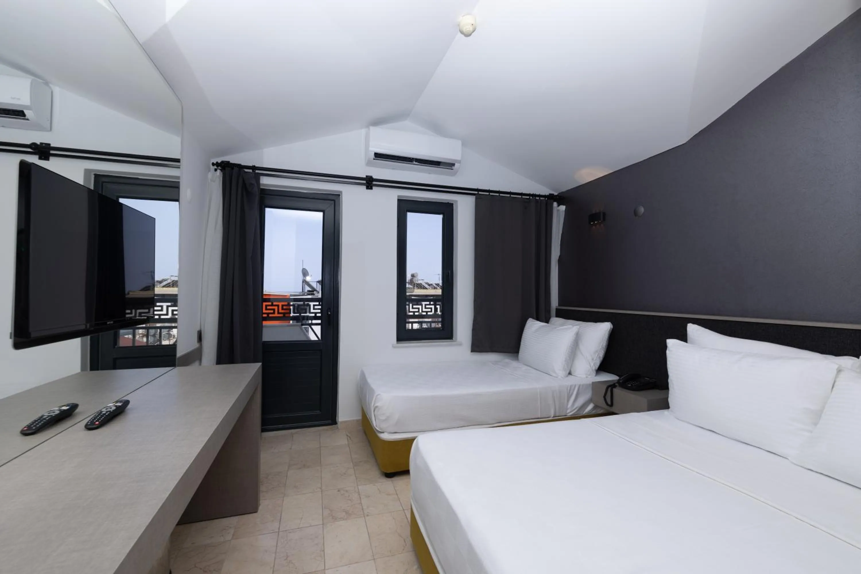 Bed in Three Points Hotel