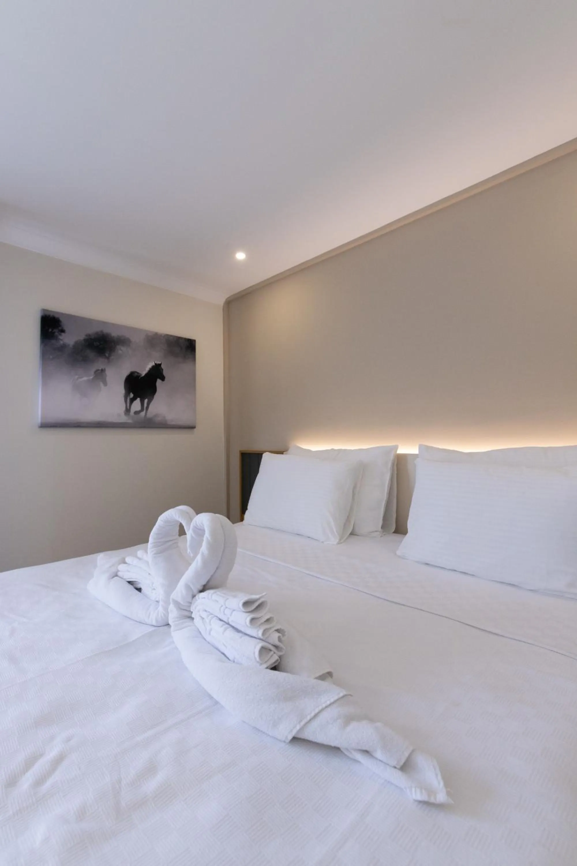 Bed in Three Points Hotel