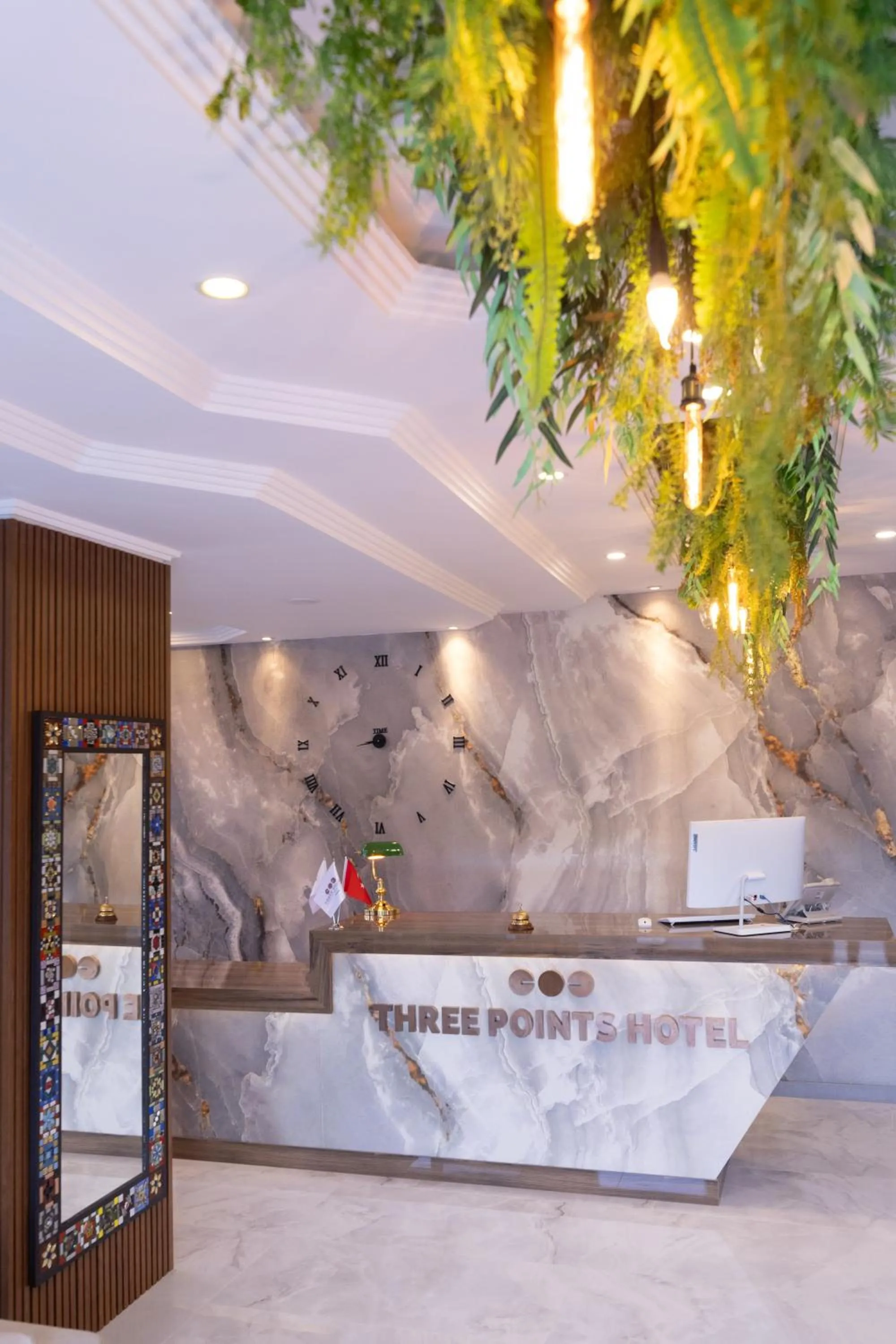 Lobby or reception in Three Points Hotel