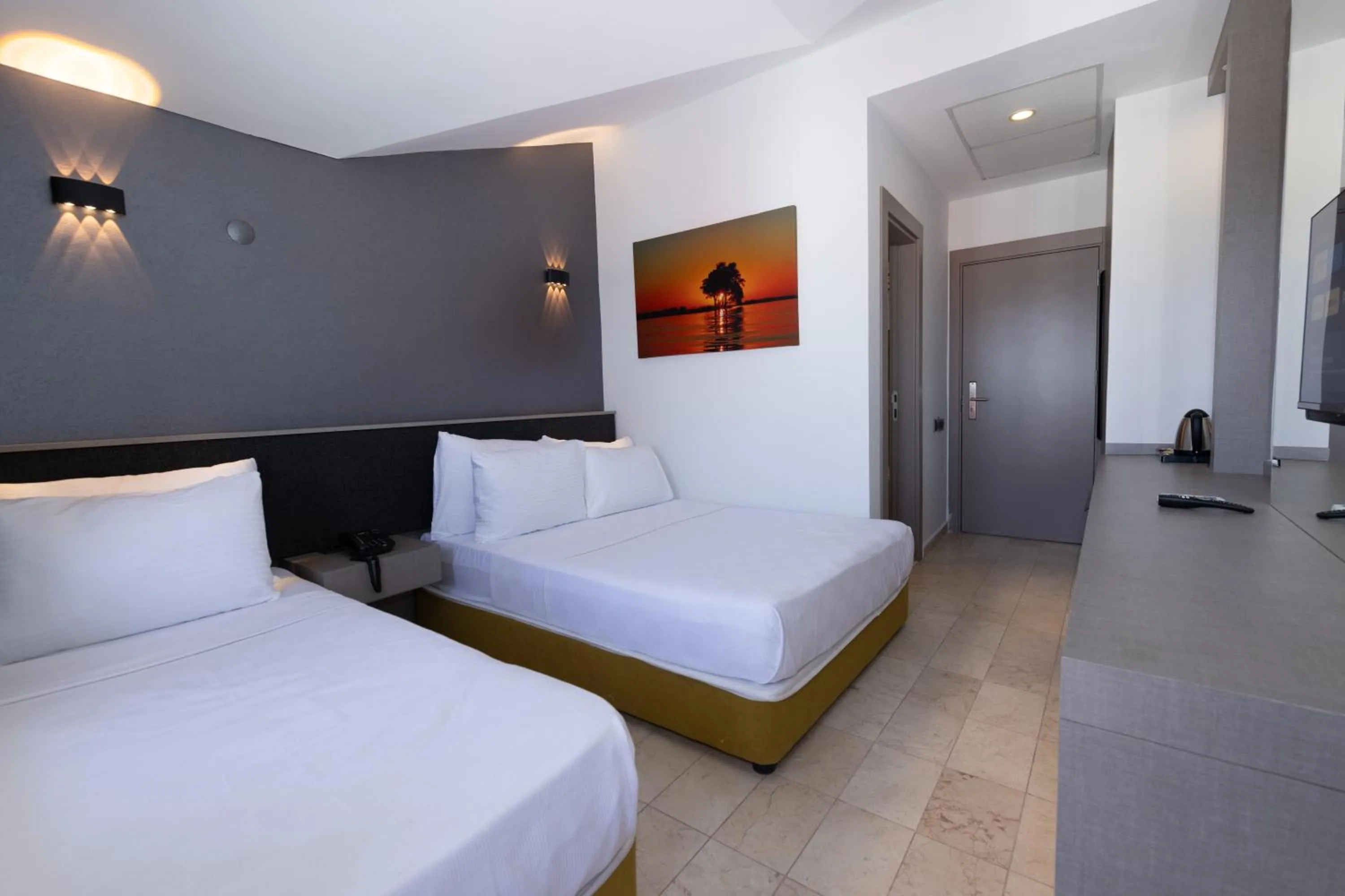 Bed in Three Points Hotel