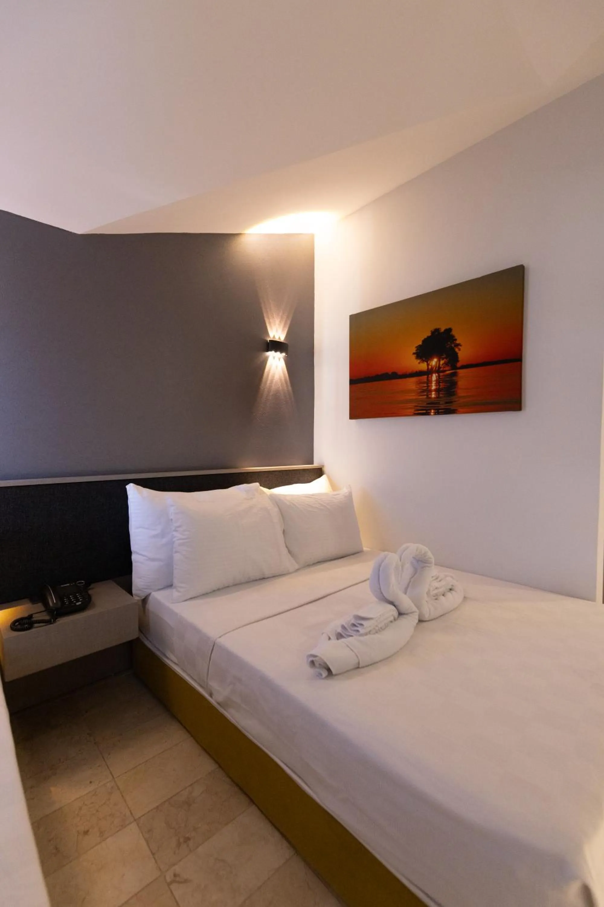 Bed in Three Points Hotel