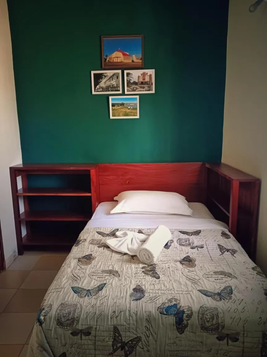 Bed in Hotel Bom Amigo