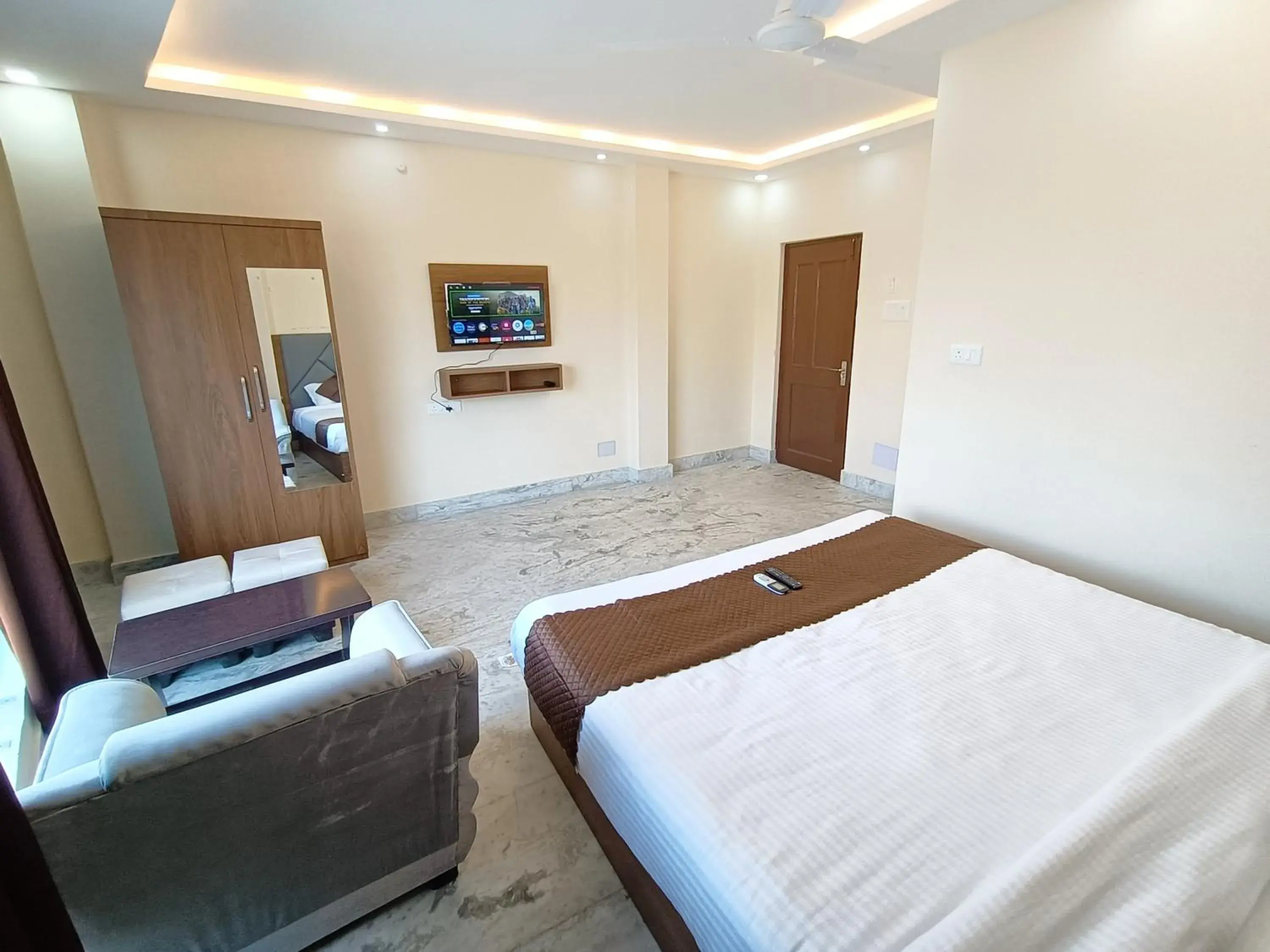 Seating area, Bed in Collection O Hotel Danish Dreamstay Seating area, Bed in Collection O Hotel Danish Dreamstay