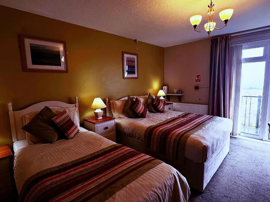 Bedroom, Bed in Ocean Haze Hotel