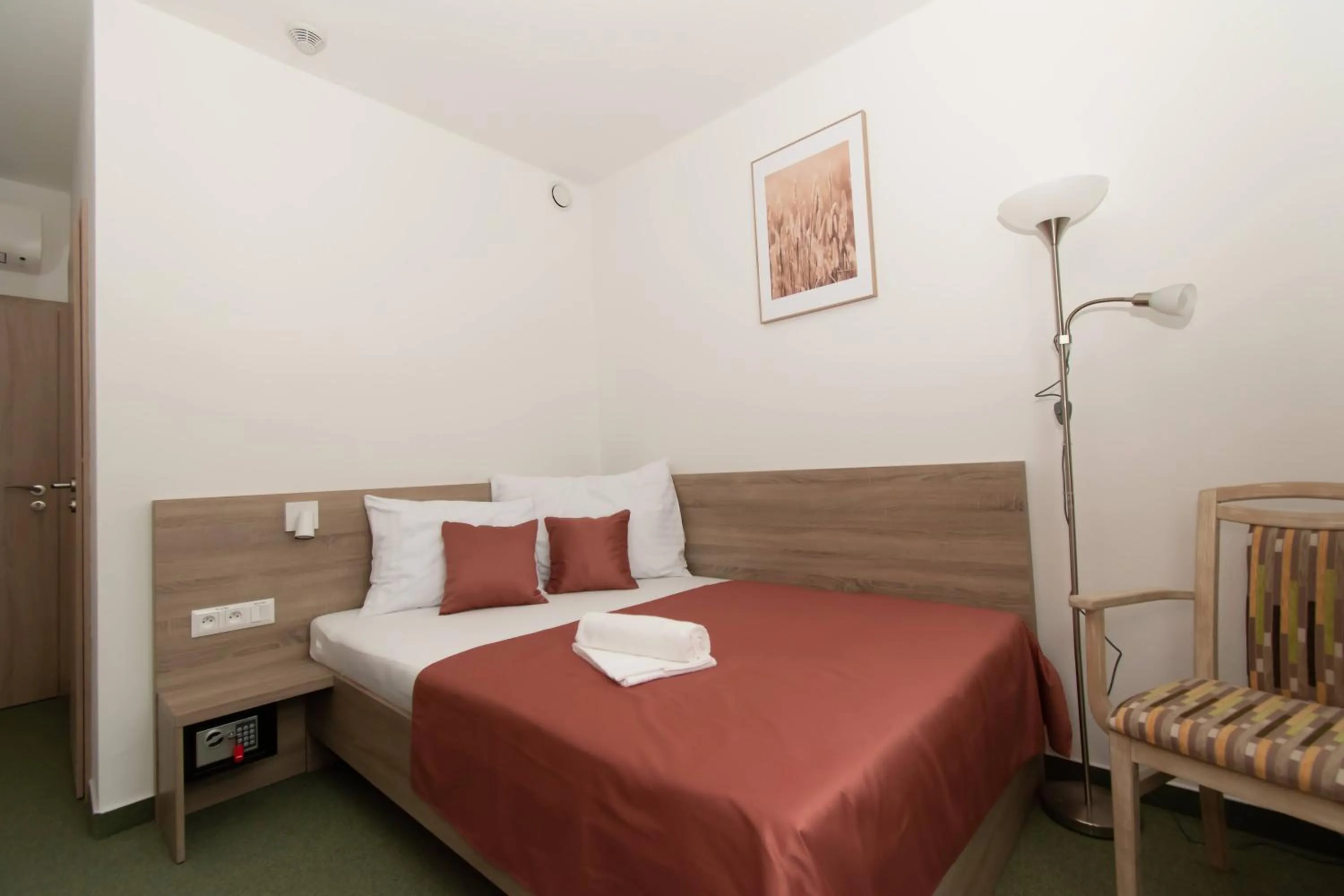 Bed in Solid Gold Garni Hotel