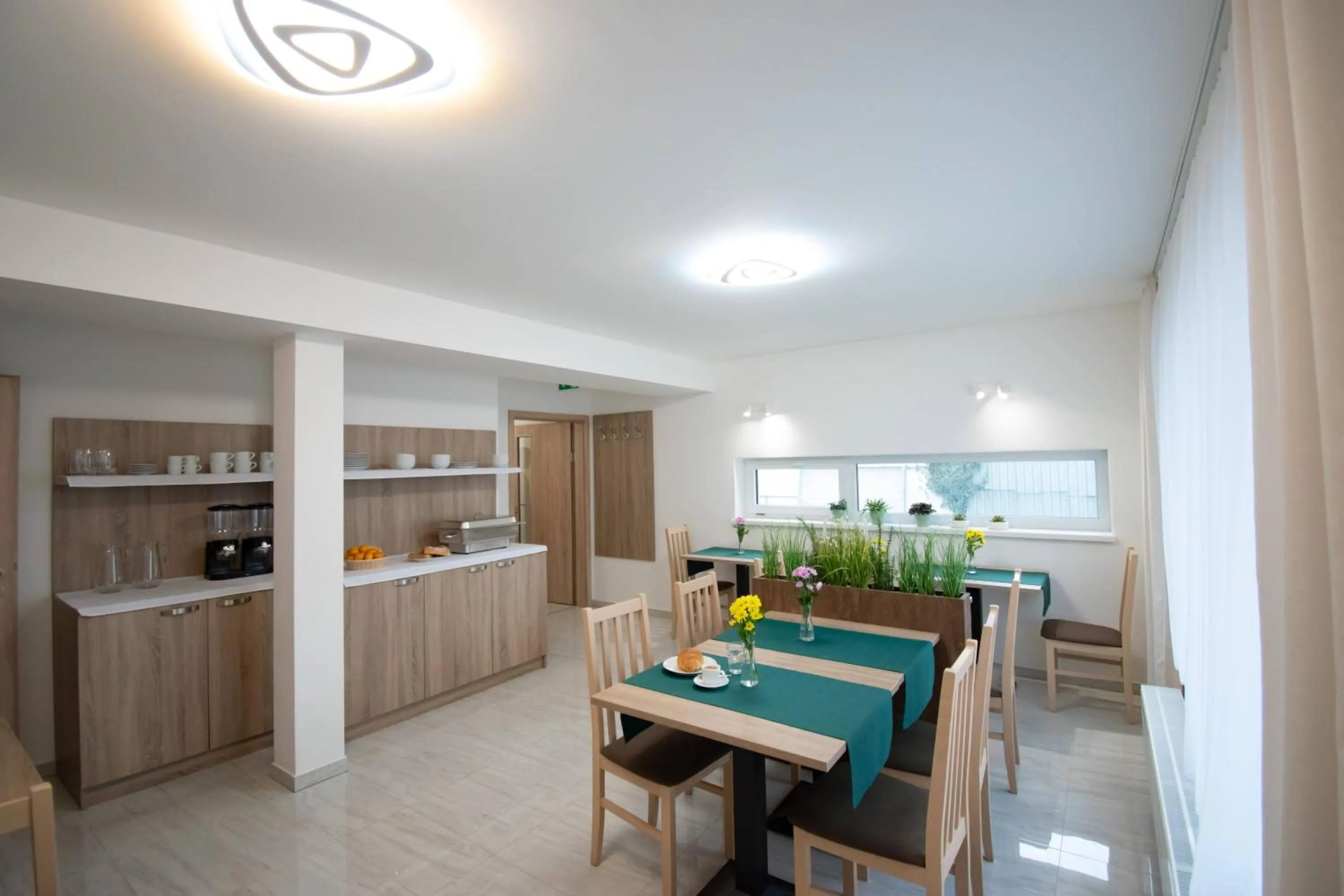 Dining area in Solid Gold Garni Hotel