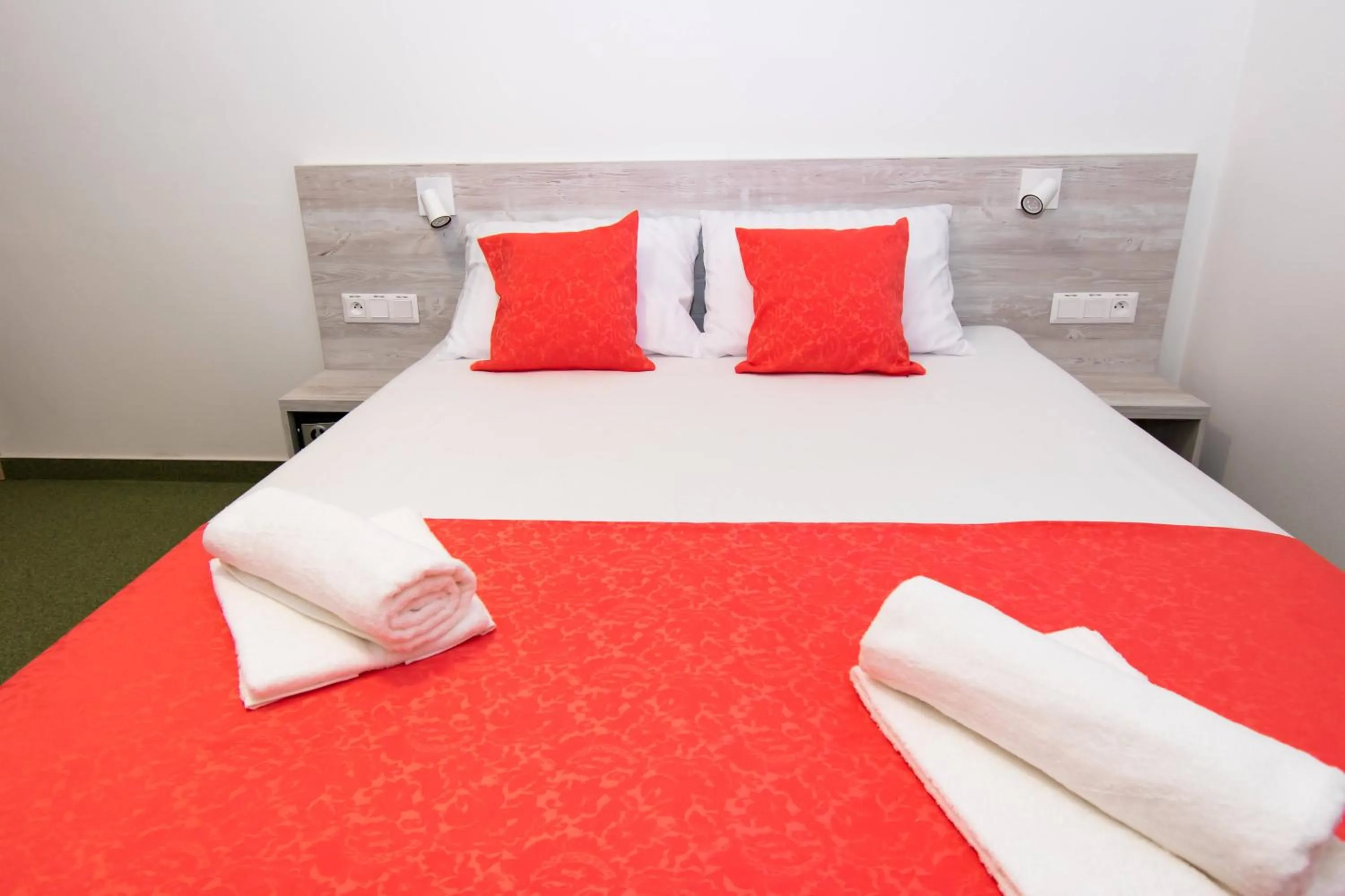 Bed in Solid Gold Garni Hotel