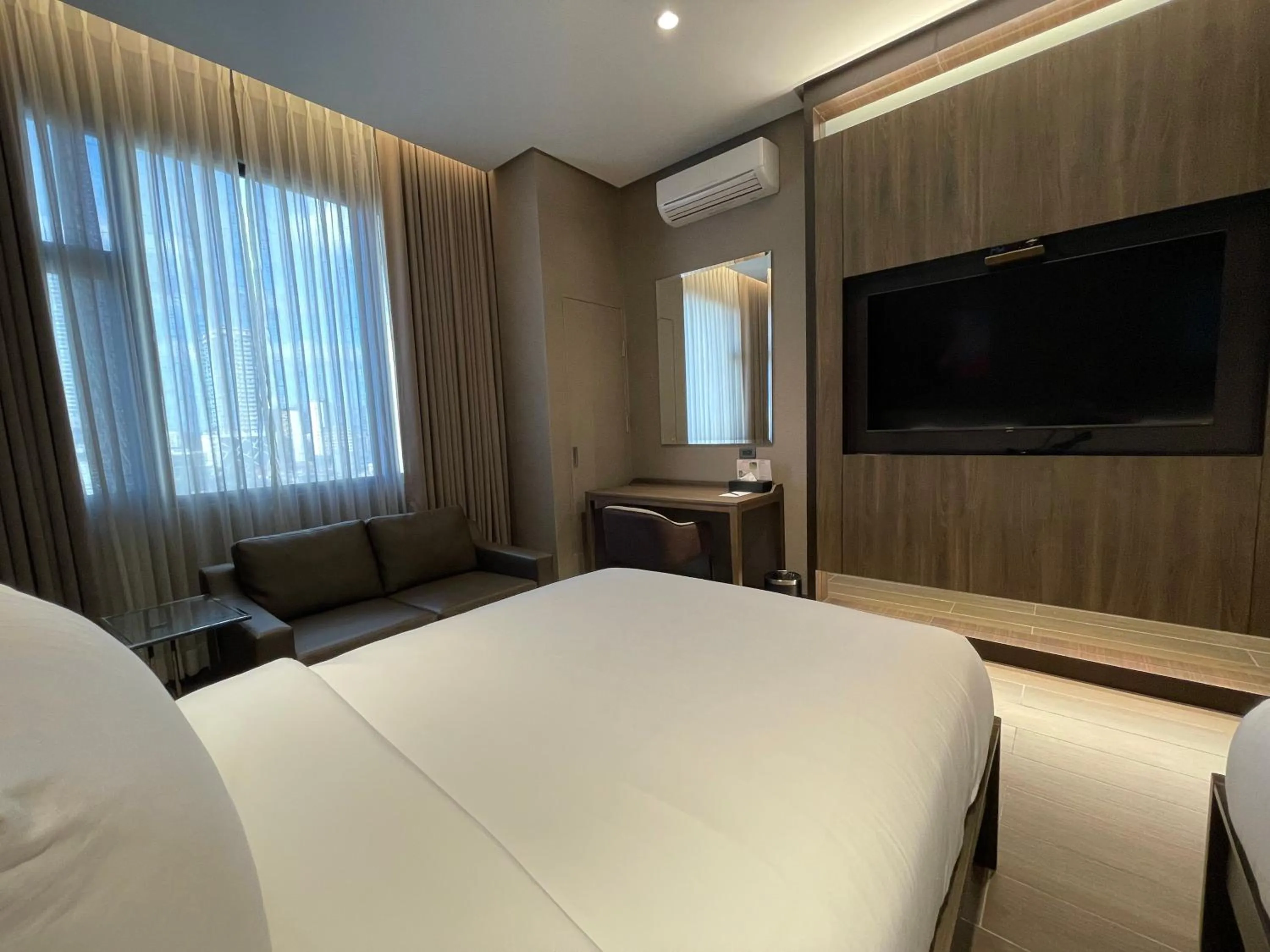 Bed in Hotel A and A Quezon City powered by Cocotel