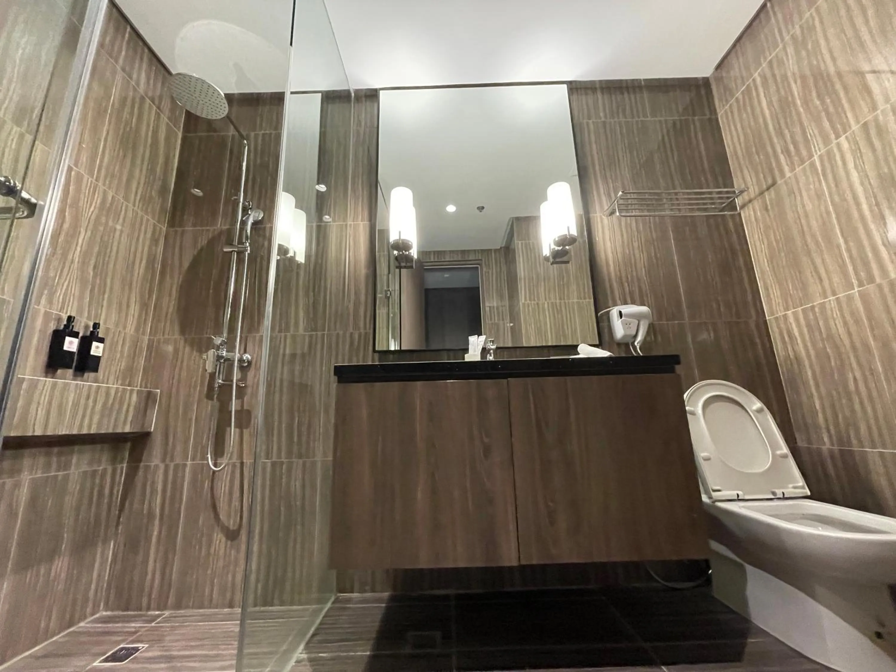 Bathroom in Hotel A and A Quezon City powered by Cocotel