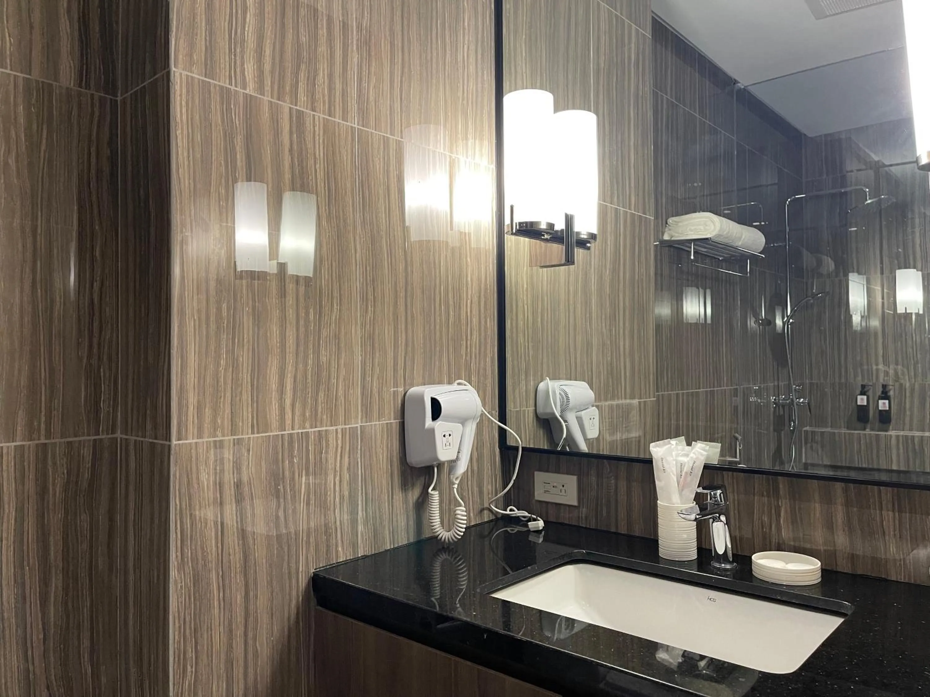 Bathroom in Hotel A and A Quezon City powered by Cocotel
