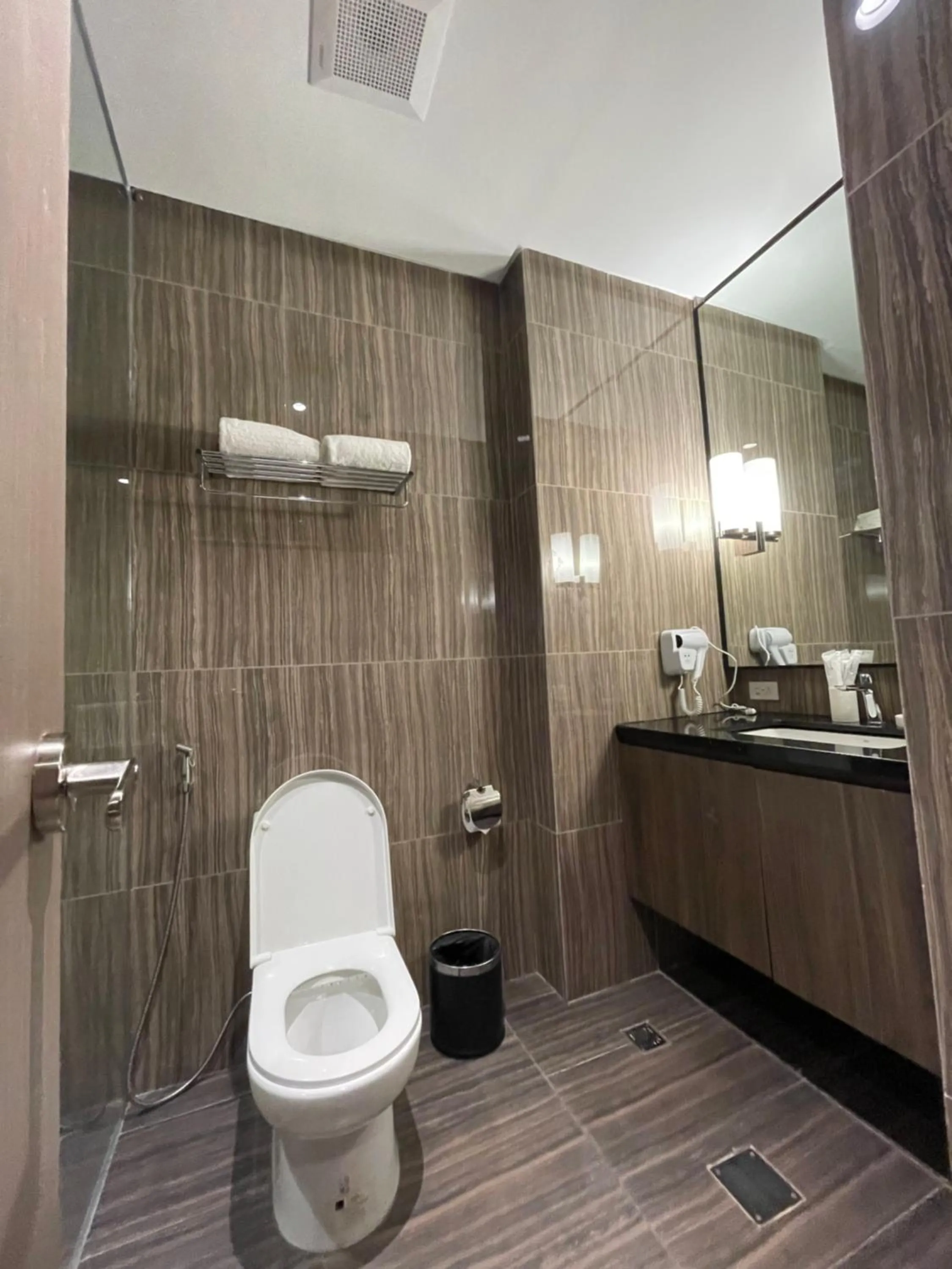 Bathroom in Hotel A and A Quezon City powered by Cocotel