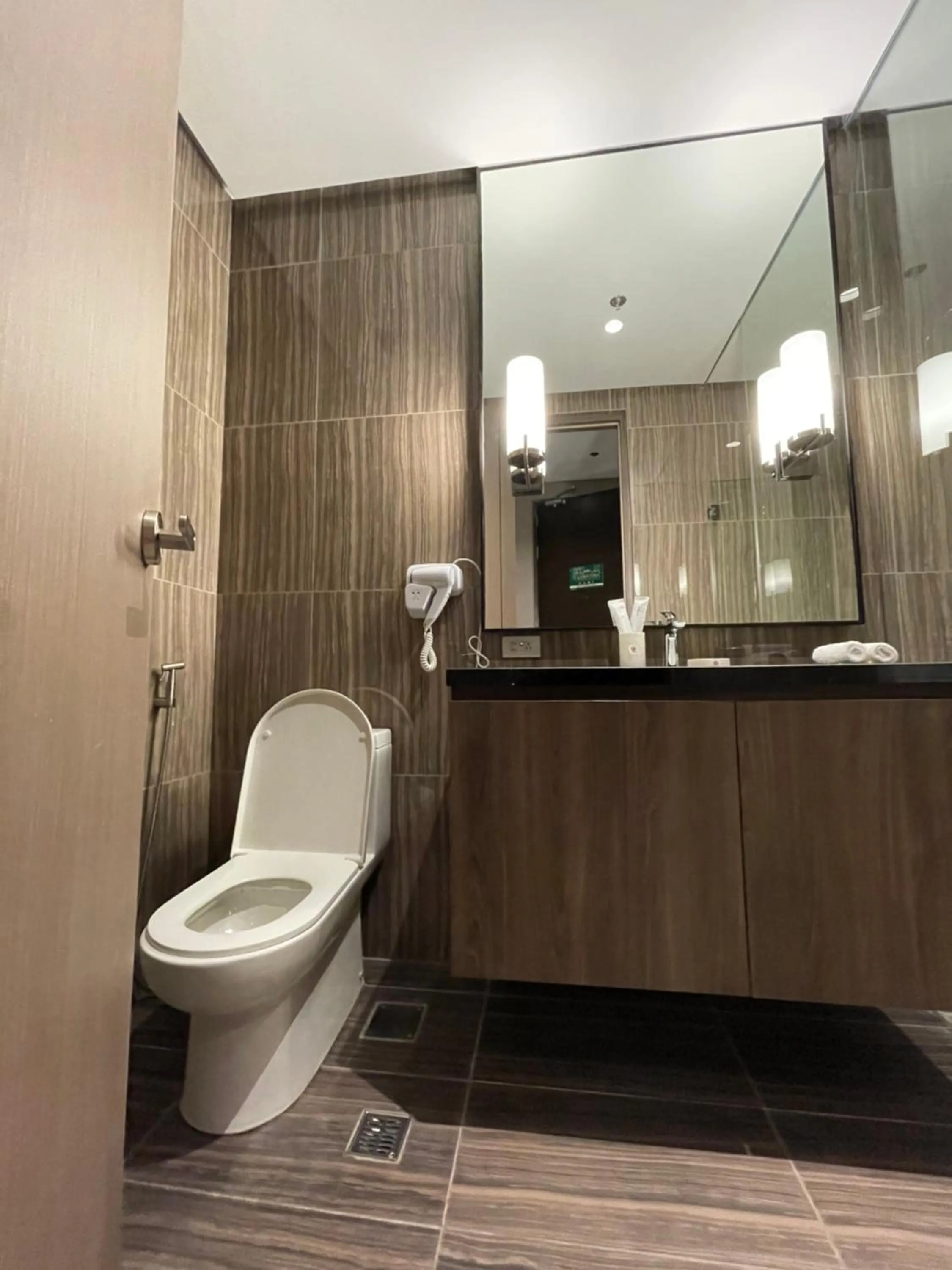 Bathroom in Hotel A and A Quezon City powered by Cocotel