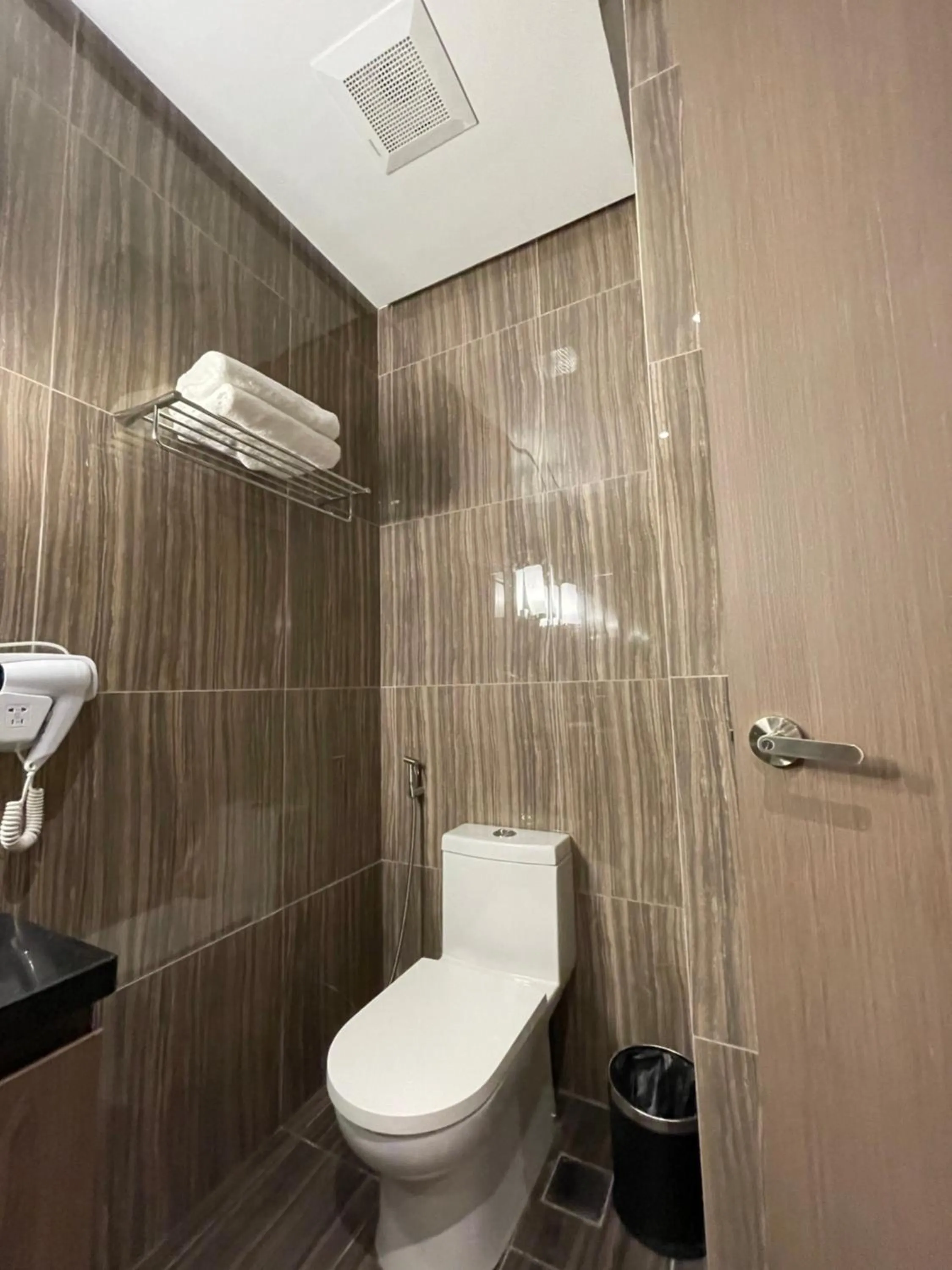 Bathroom in Hotel A and A Quezon City powered by Cocotel