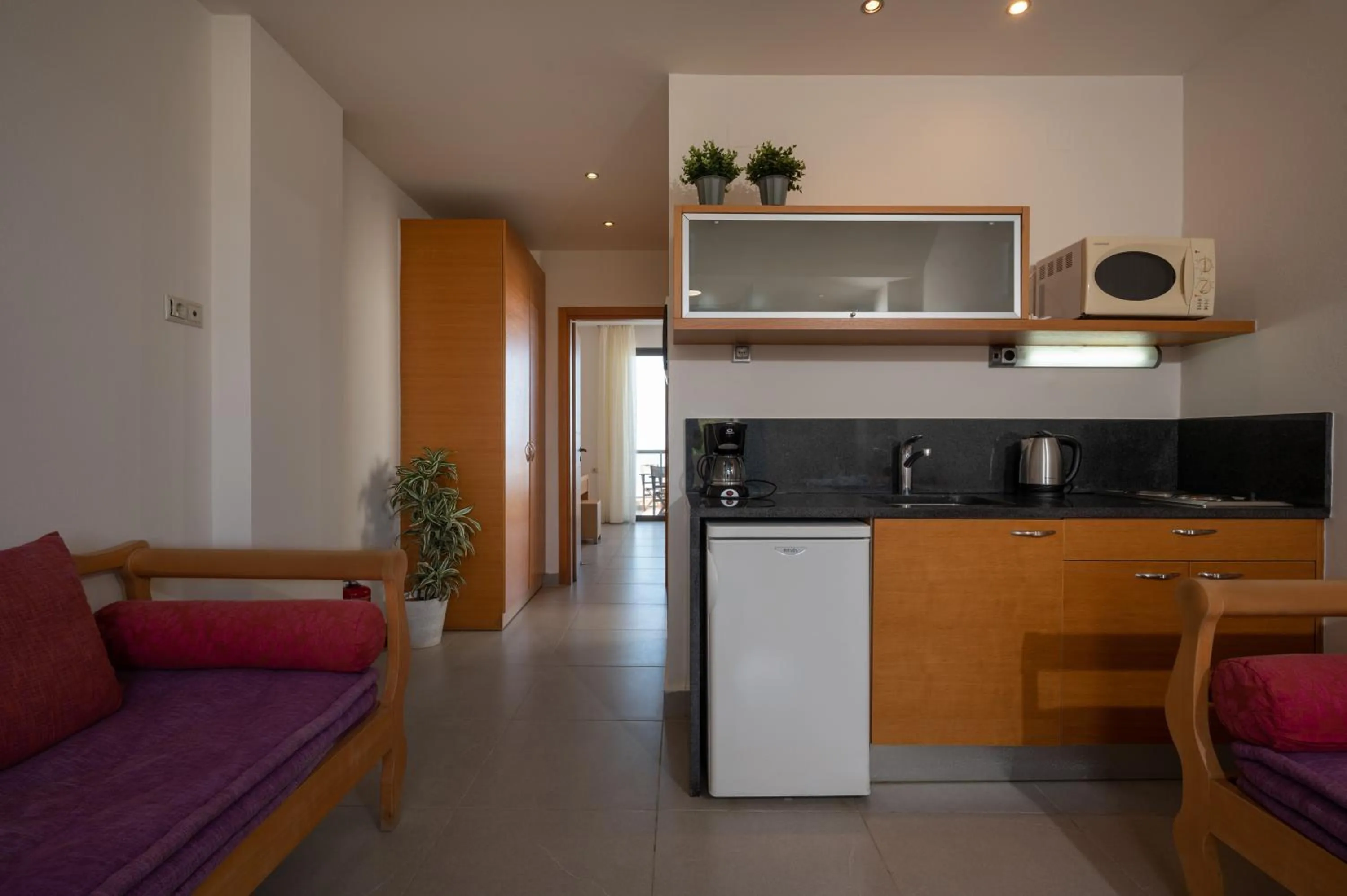 Kitchen or kitchenette in Creteco Hotel & Suites
