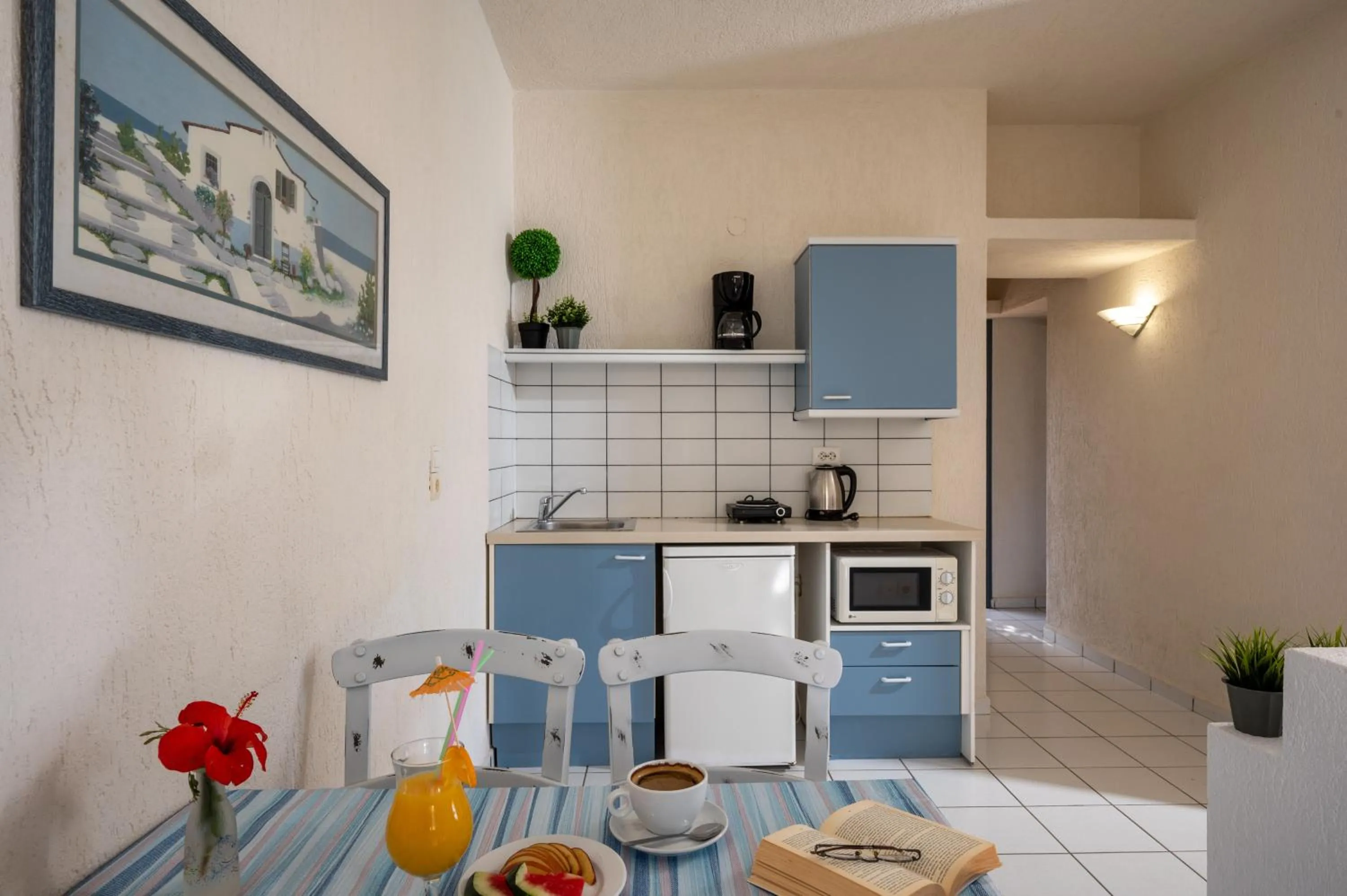 Kitchen or kitchenette in Creteco Hotel & Suites