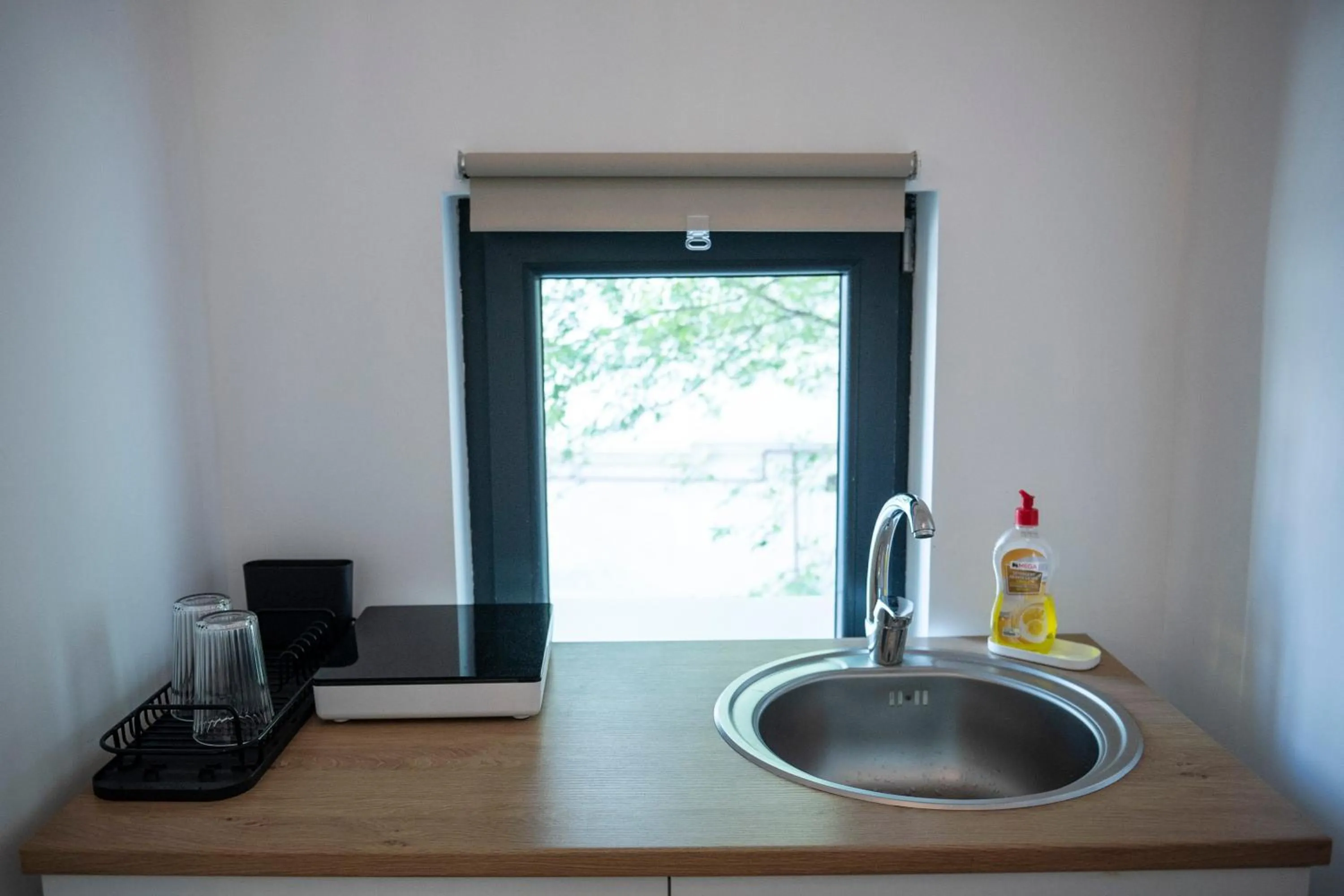 Kitchen or kitchenette in LazyNest Residence