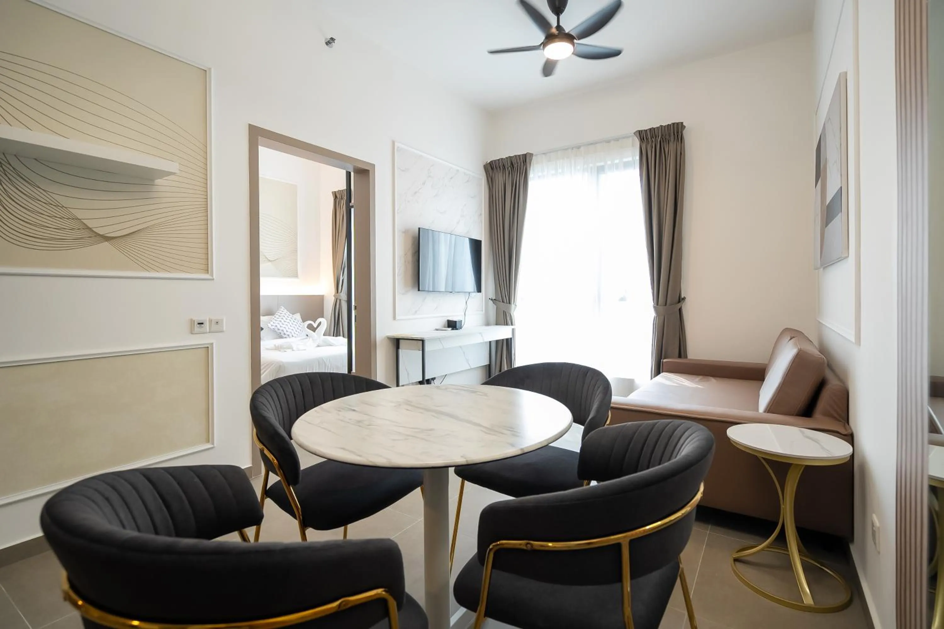 Living room, Bed in Mossaz Leisure Suites Kuala Lumpur