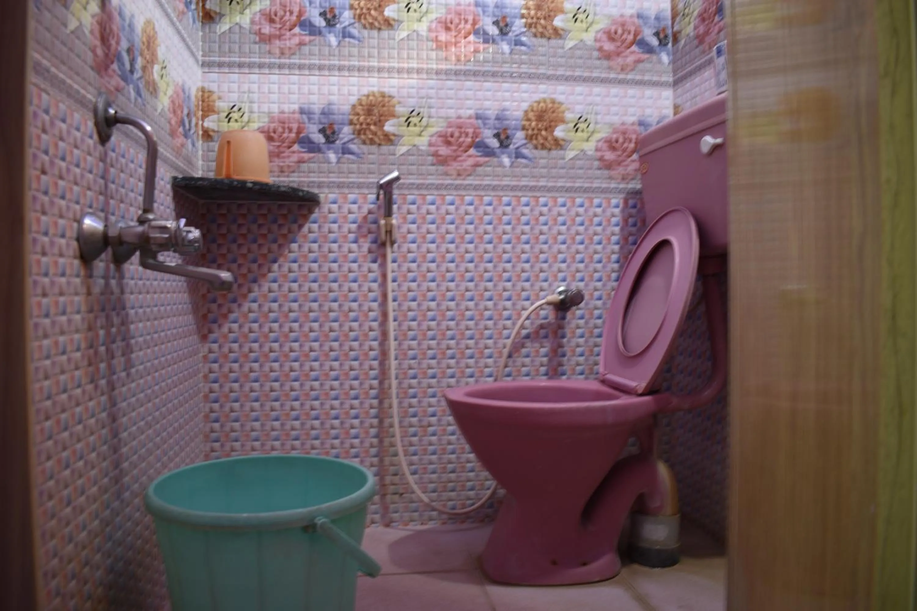 Toilet in Rainbow Guest House