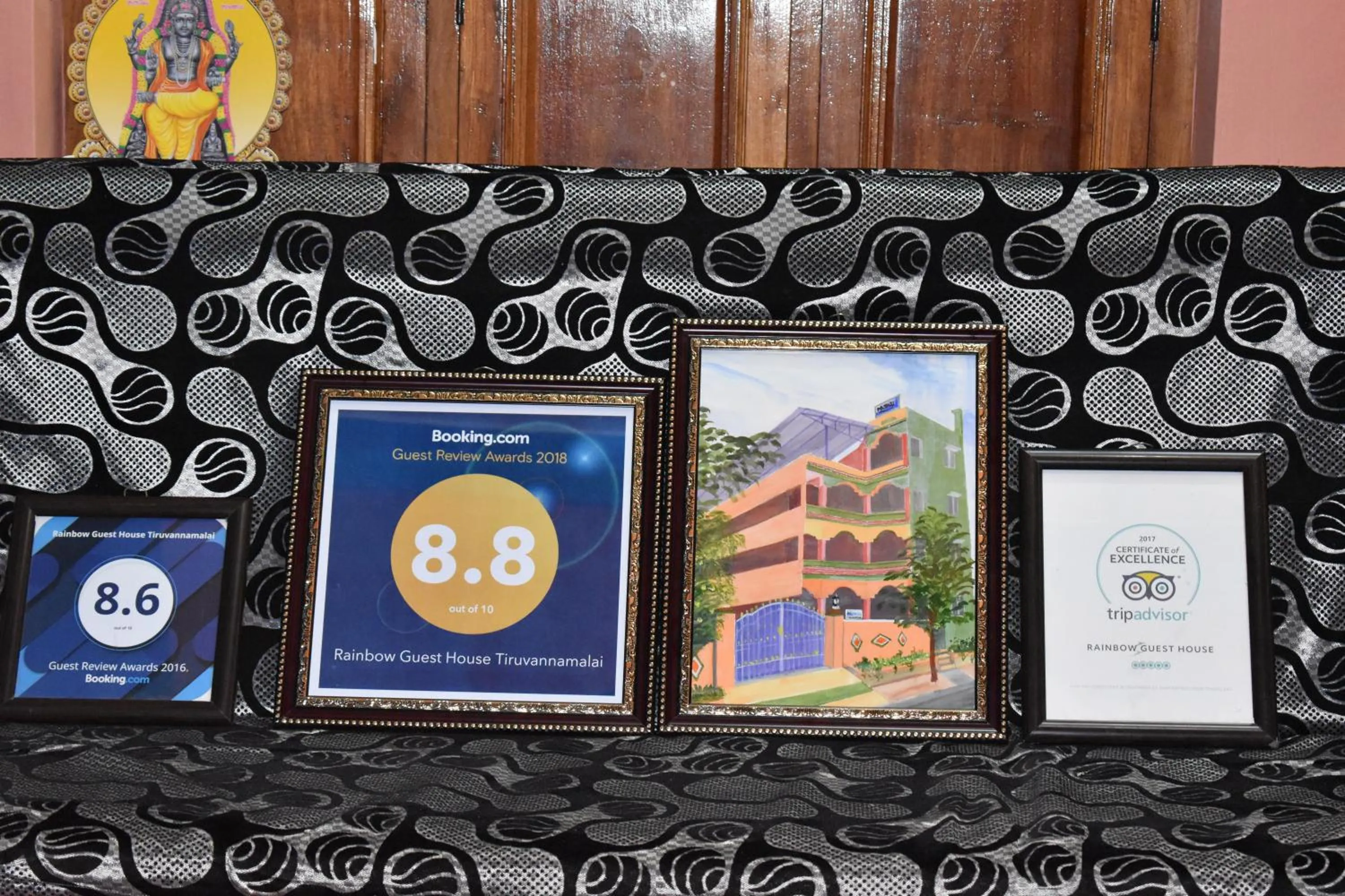 Logo/Certificate/Sign in Rainbow Guest House