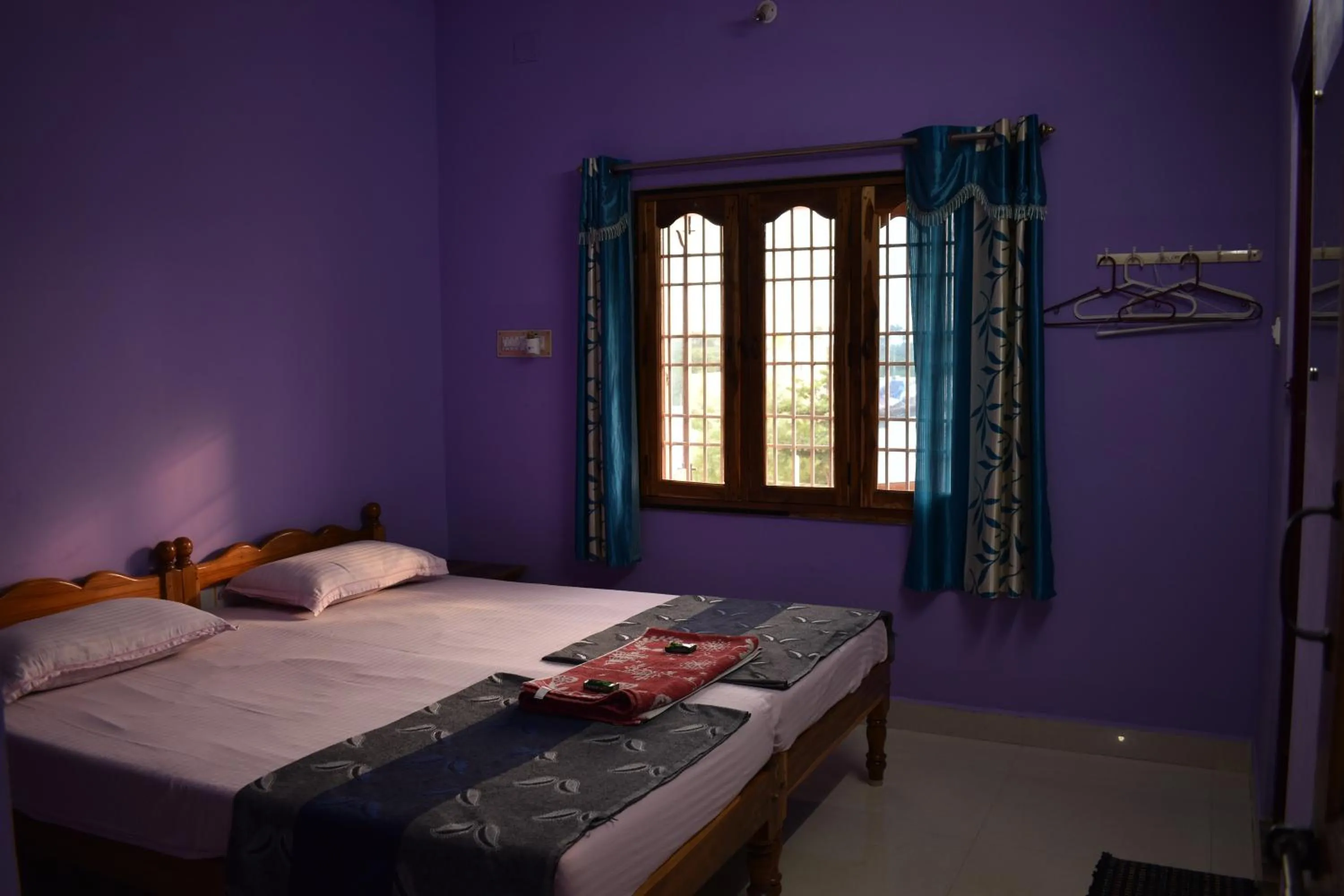 Bed in Rainbow Guest House