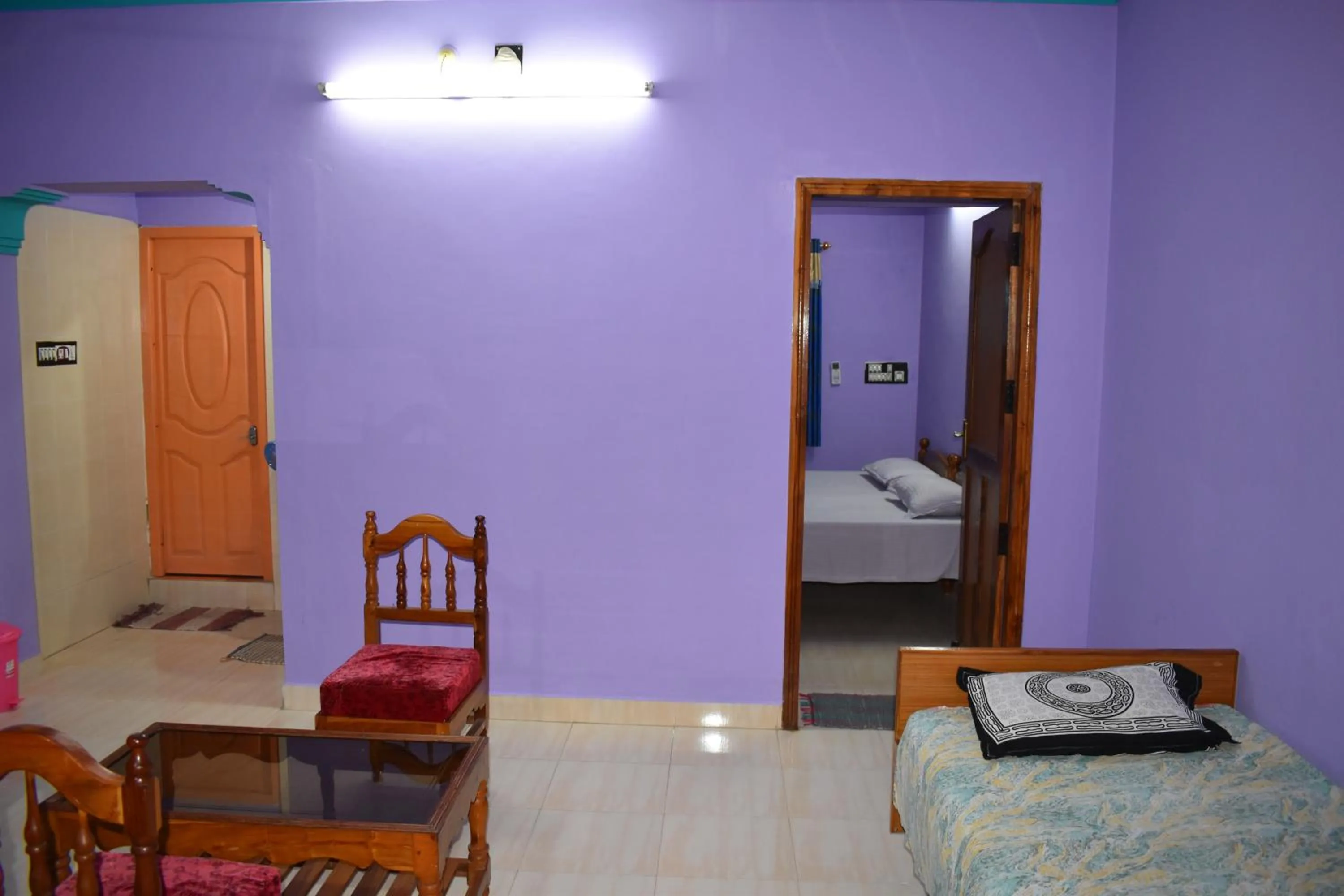 Bed in Rainbow Guest House