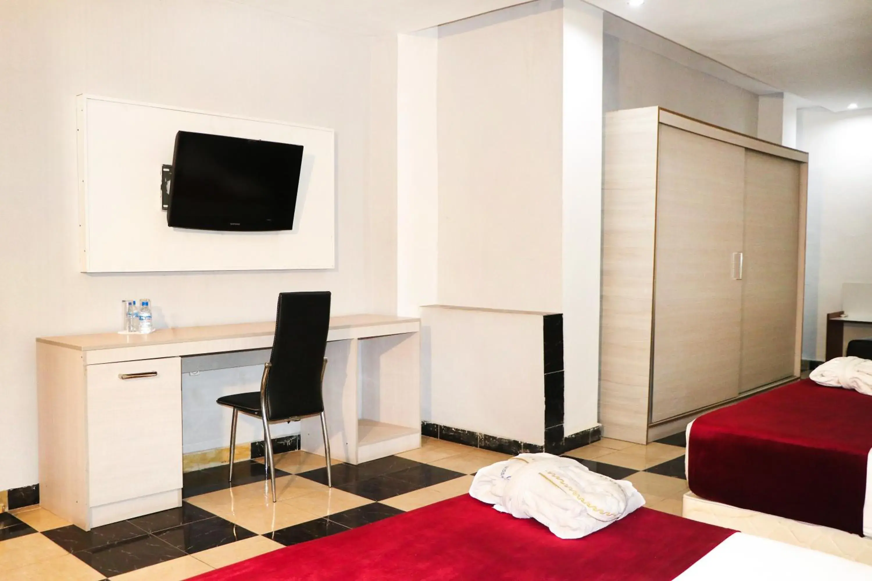 Bed in Hôtel Saphir Bed in Hôtel Saphir