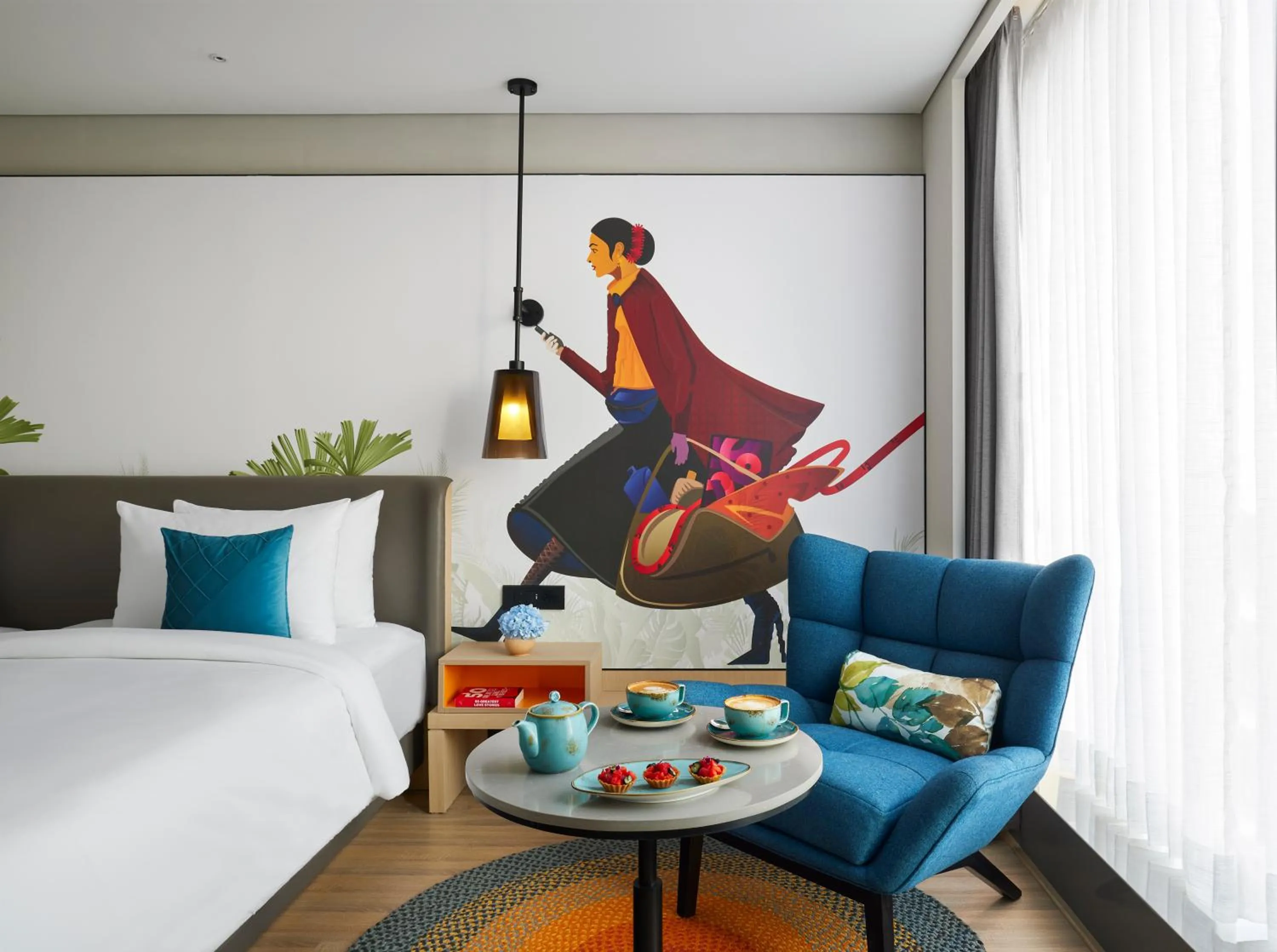 Seating area, Bed in Hyatt Centric Hebbal Bengaluru