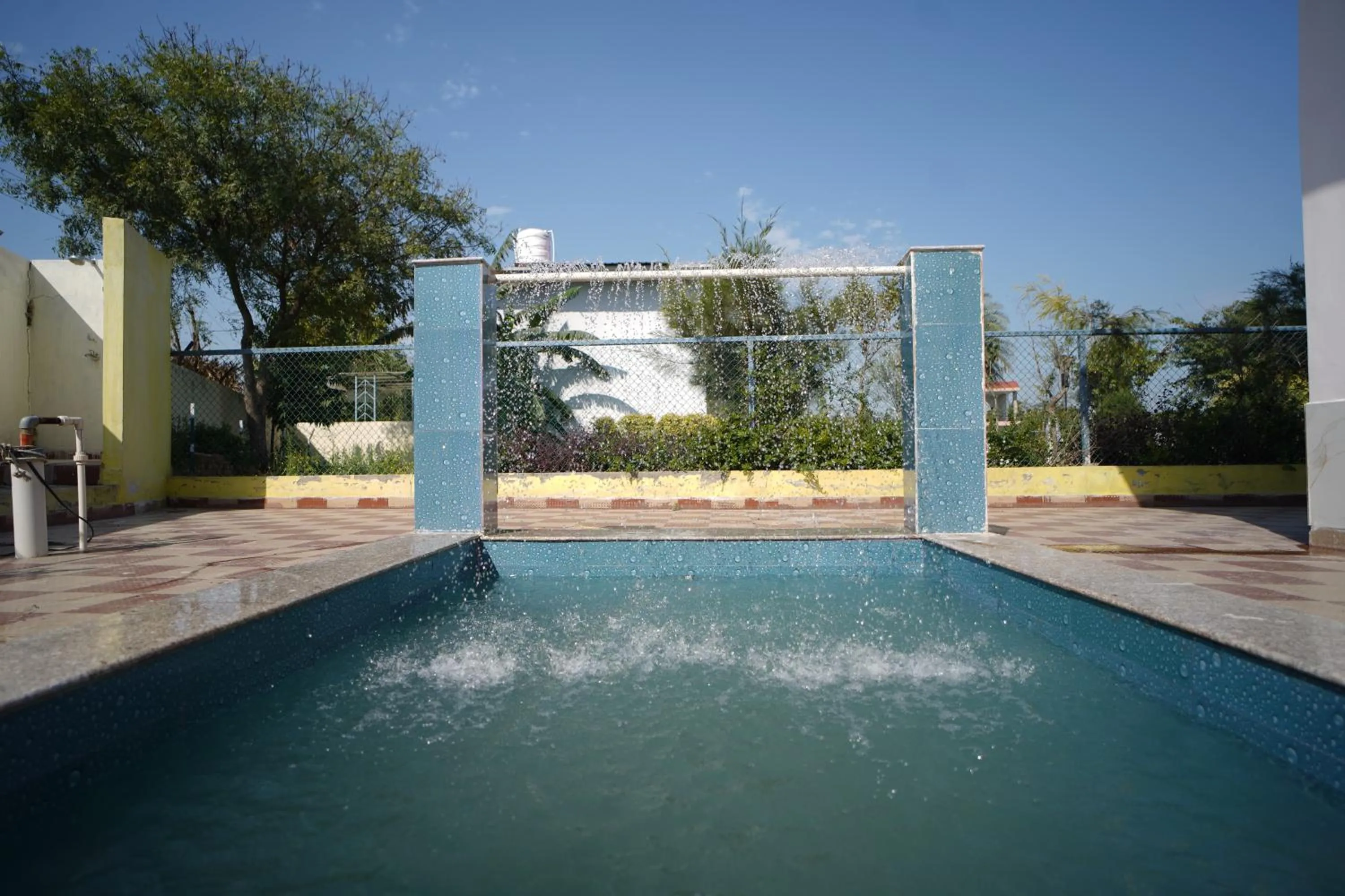 Swimming pool in SAMALIA AGRO RESORT VRINDAVAN