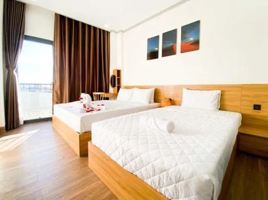 Bed in OSAKA BOUTIQUE PHAN THIET HOTEL