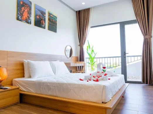 Bed in OSAKA BOUTIQUE PHAN THIET HOTEL