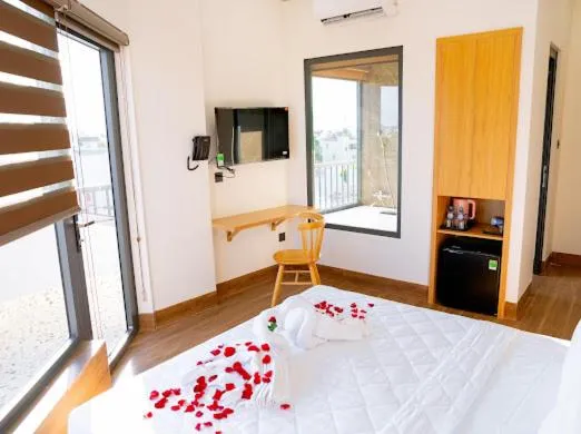 Bed in OSAKA BOUTIQUE PHAN THIET HOTEL