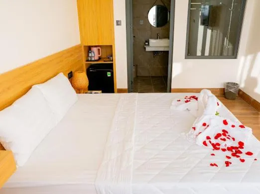 Bed in OSAKA BOUTIQUE PHAN THIET HOTEL