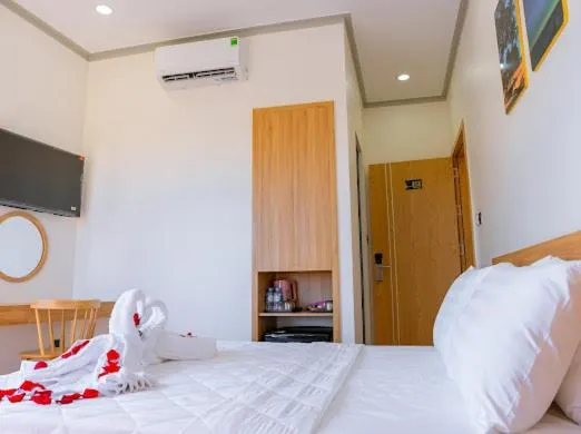 Bed in OSAKA BOUTIQUE PHAN THIET HOTEL