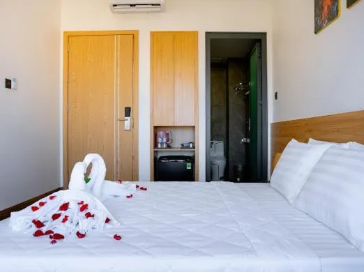 Bed in OSAKA BOUTIQUE PHAN THIET HOTEL