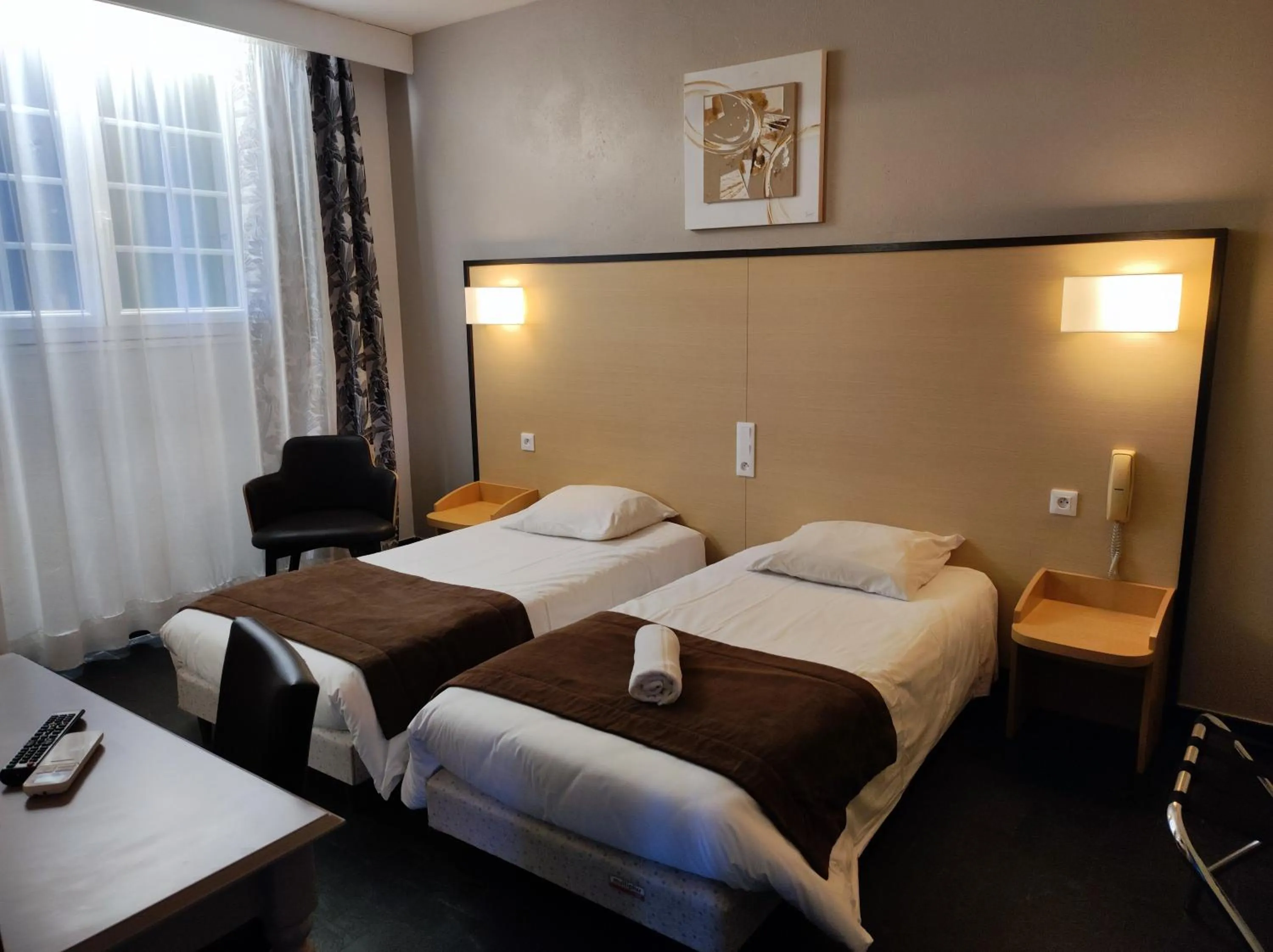 Bed in Hôtel et Appart'Hôtel Le Relais Du Val D'Orbieu