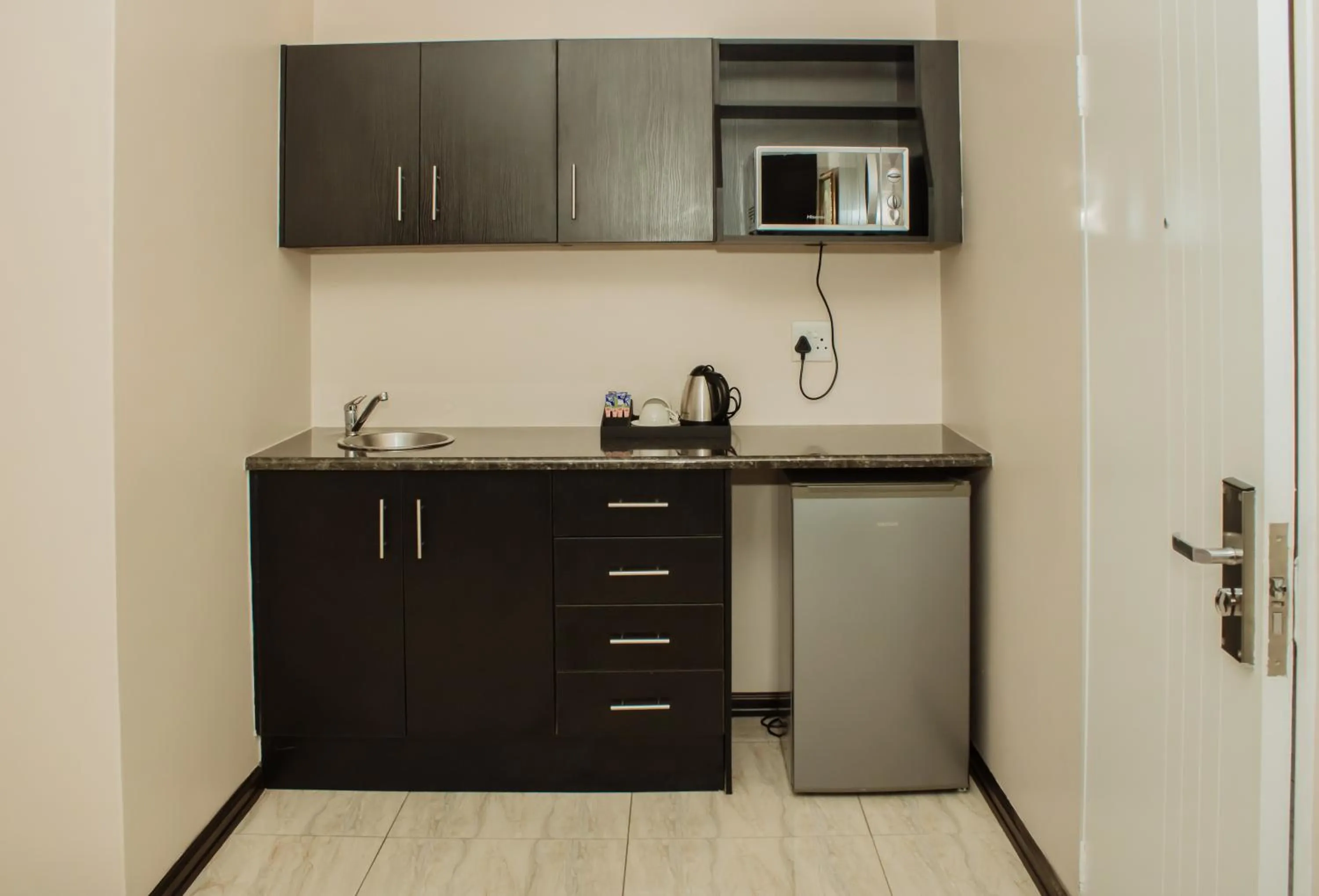 Kitchen or kitchenette in Heavenly Boutique Hotel