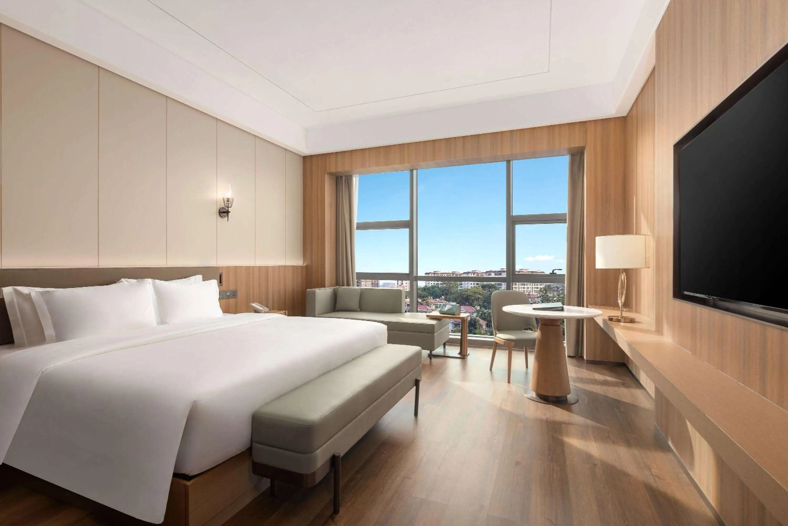 Photo of the whole room, Bed in Wyndham Xishuangbanna Qingquan