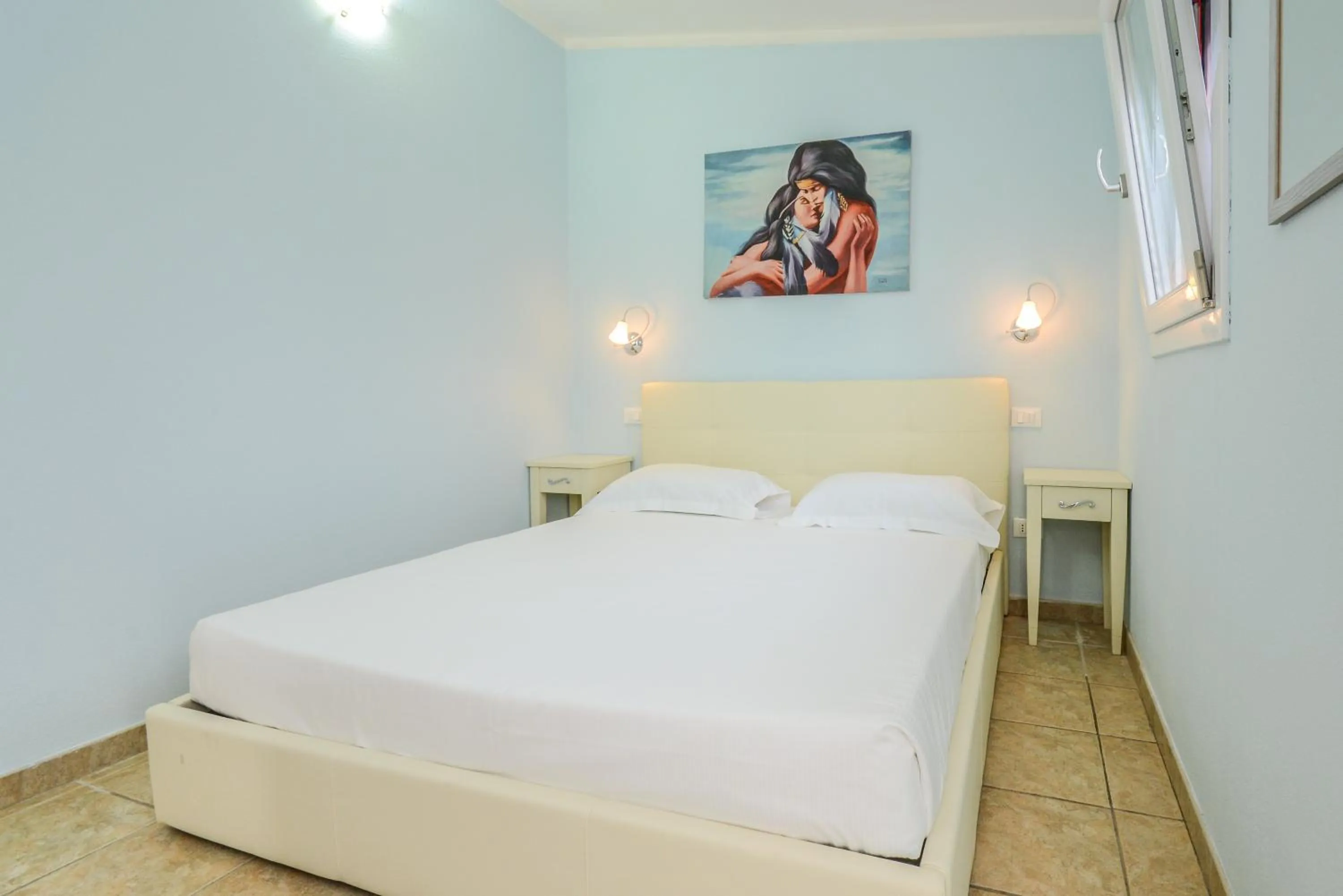 Bed in VILLA GARUTI VILLAGE