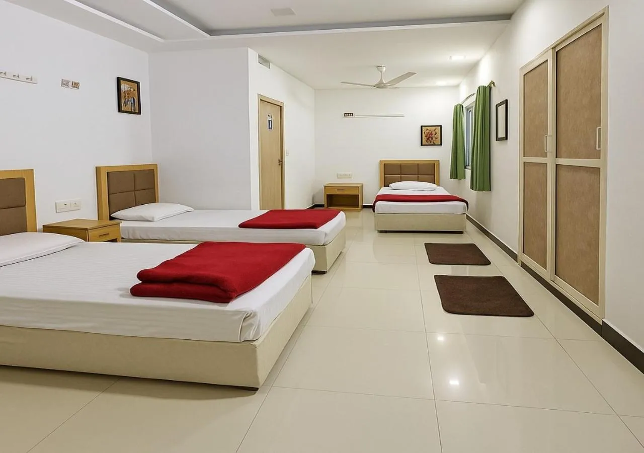 Bedroom, Bed in Stay Guru Usha Residency