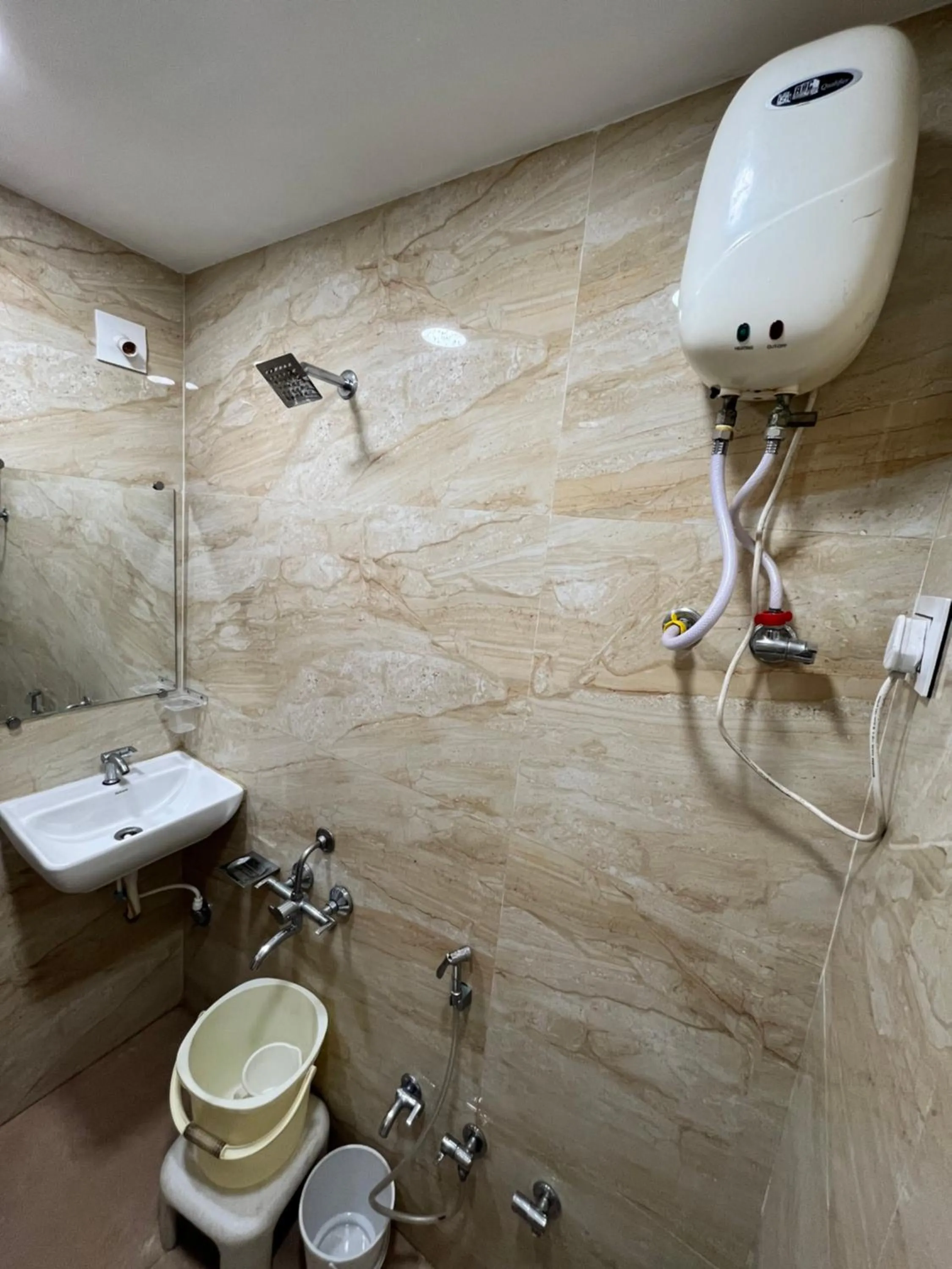 Bathroom in Stay Guru Usha Residency