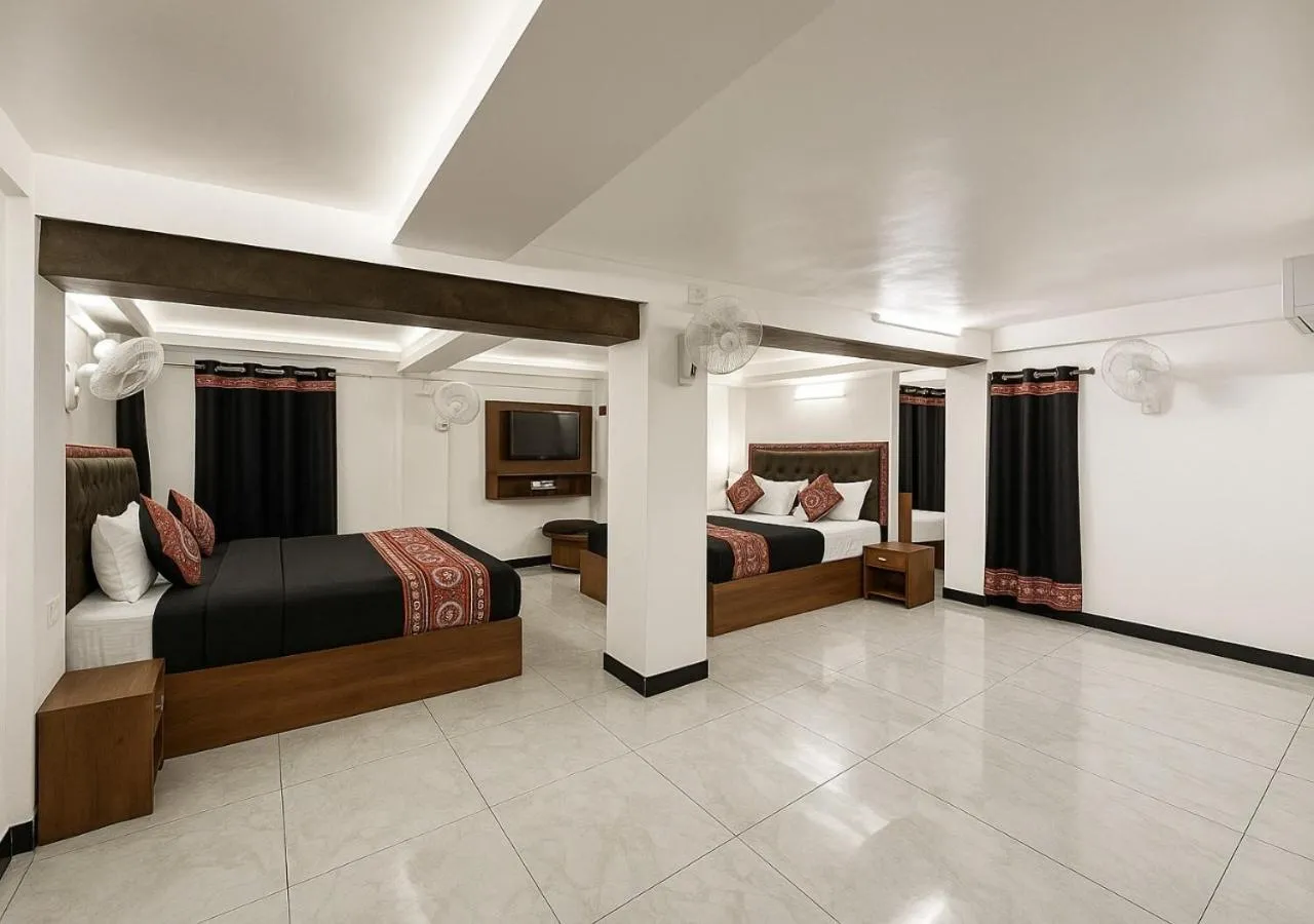 Bedroom, Bed in Stay Guru Usha Residency