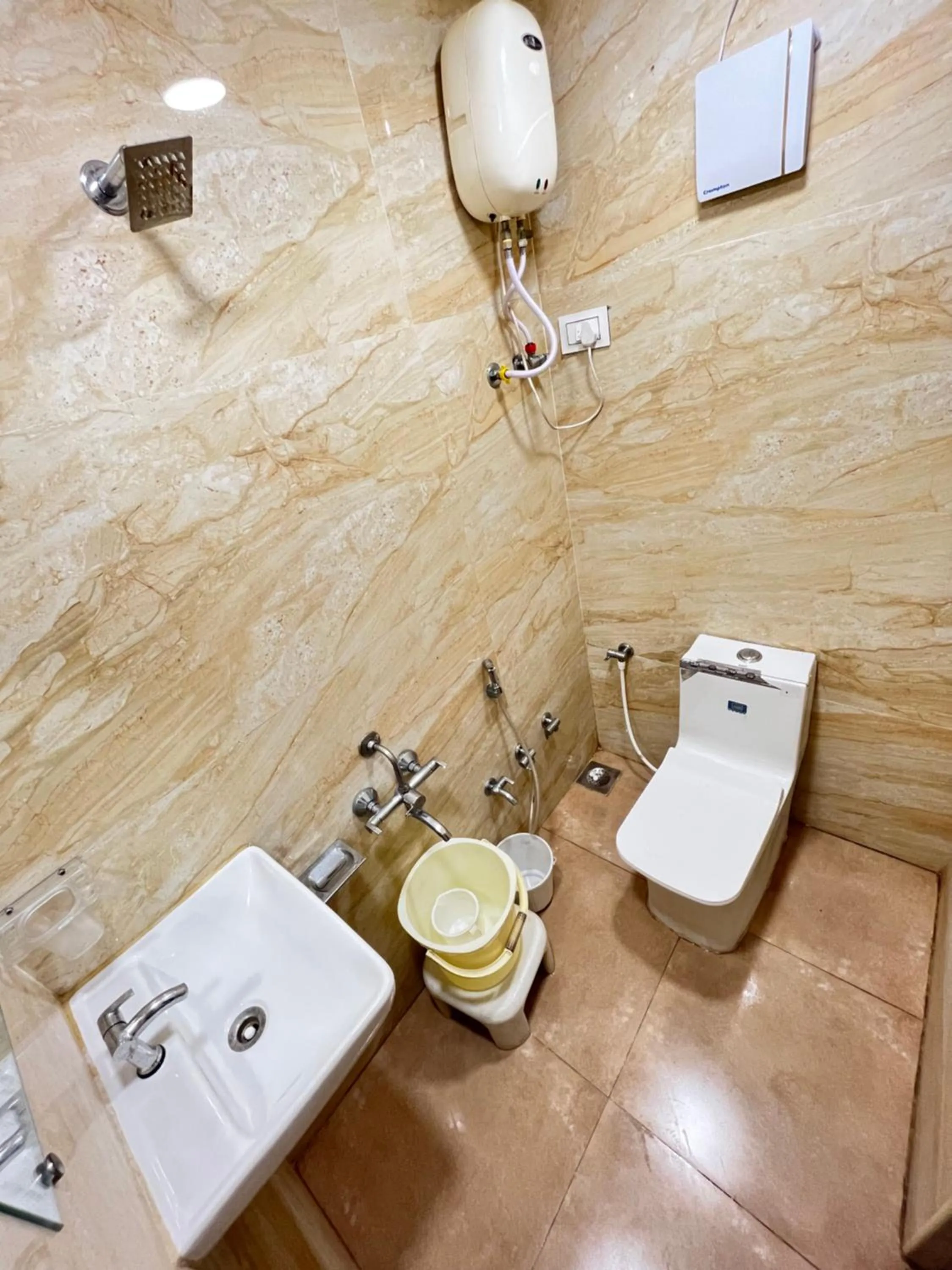 Bathroom in Stay Guru Usha Residency