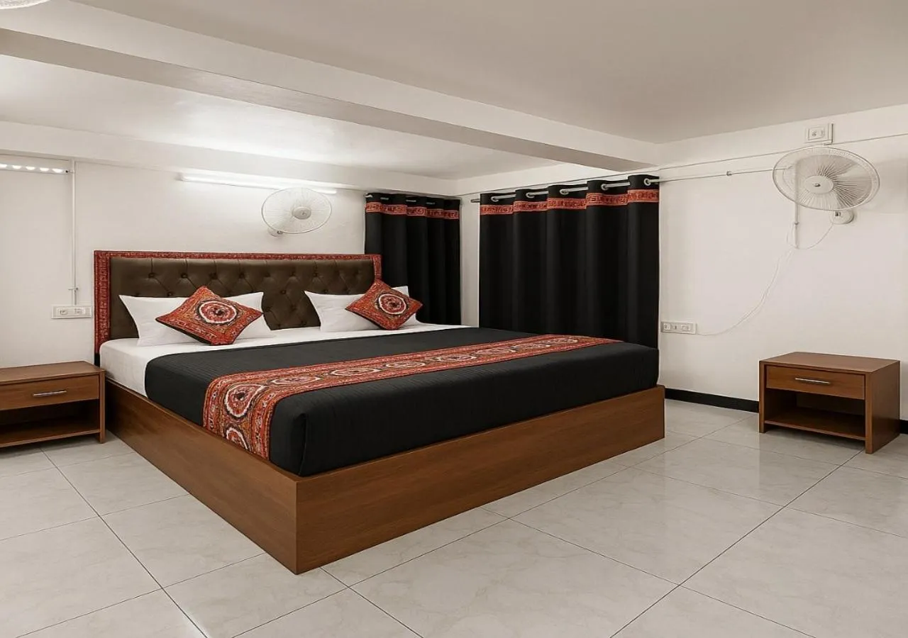 Bedroom, Bed in Stay Guru Usha Residency