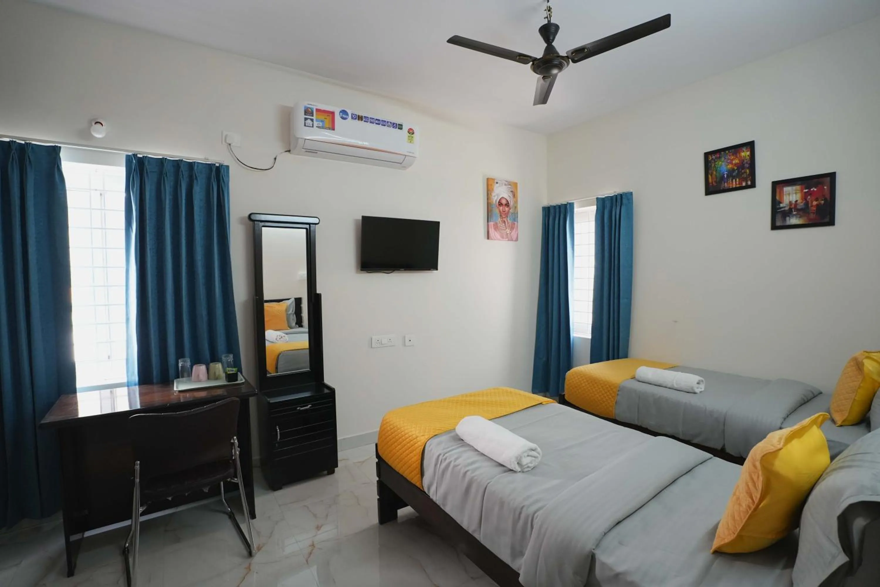 Bed in Yellow Bells Serviced Apartments Hitech City