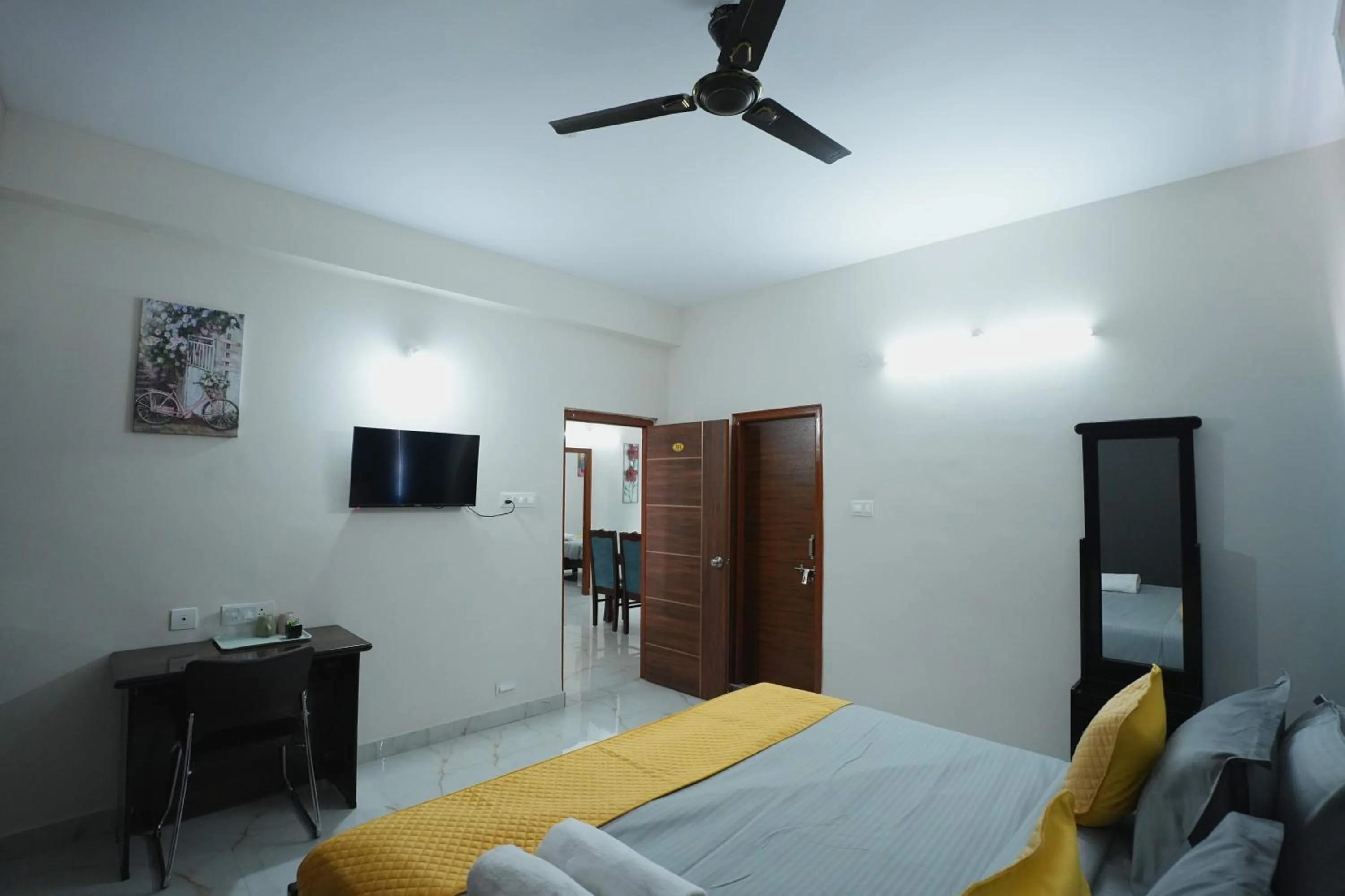 Bed in Yellow Bells Serviced Apartments Hitech City