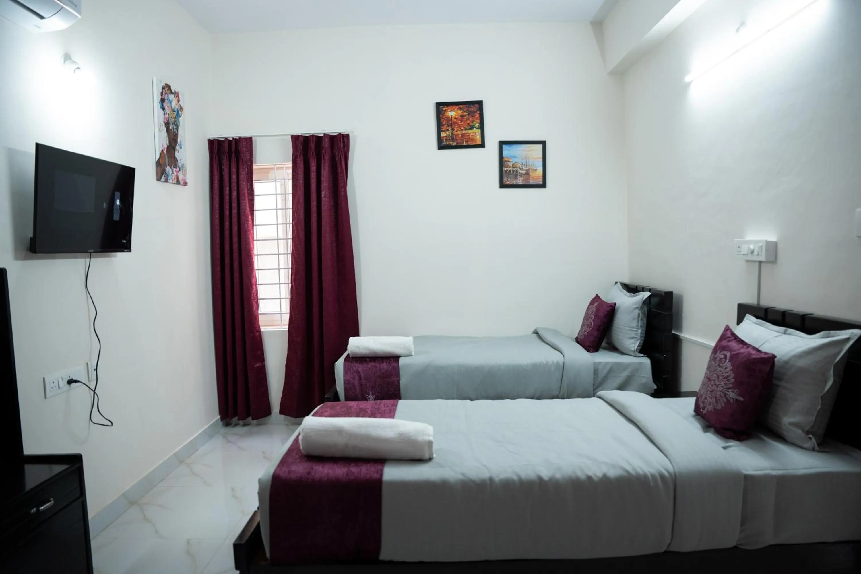 Bed in Yellow Bells Serviced Apartments Hitech City