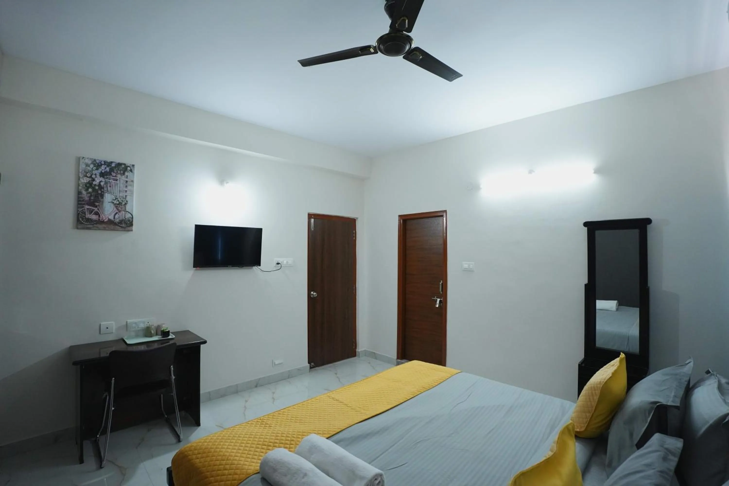 Bed in Yellow Bells Serviced Apartments Hitech City