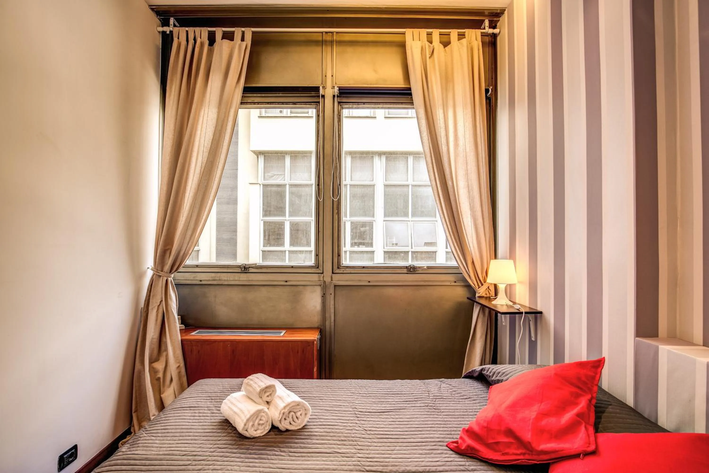 Bed in M&L Apartments - Ardesia Colosseo