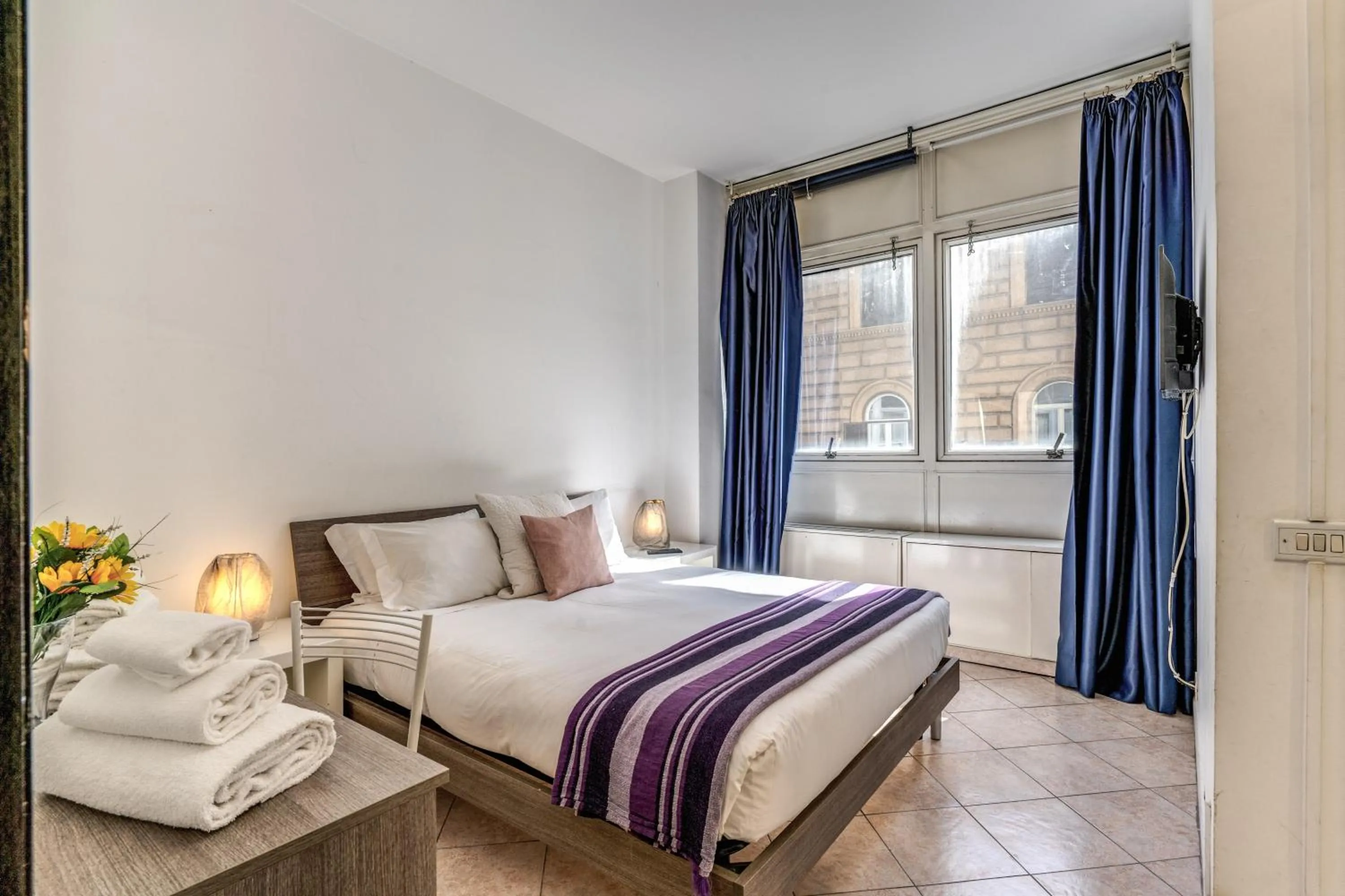 Bed in M&L Apartments - Ardesia Colosseo