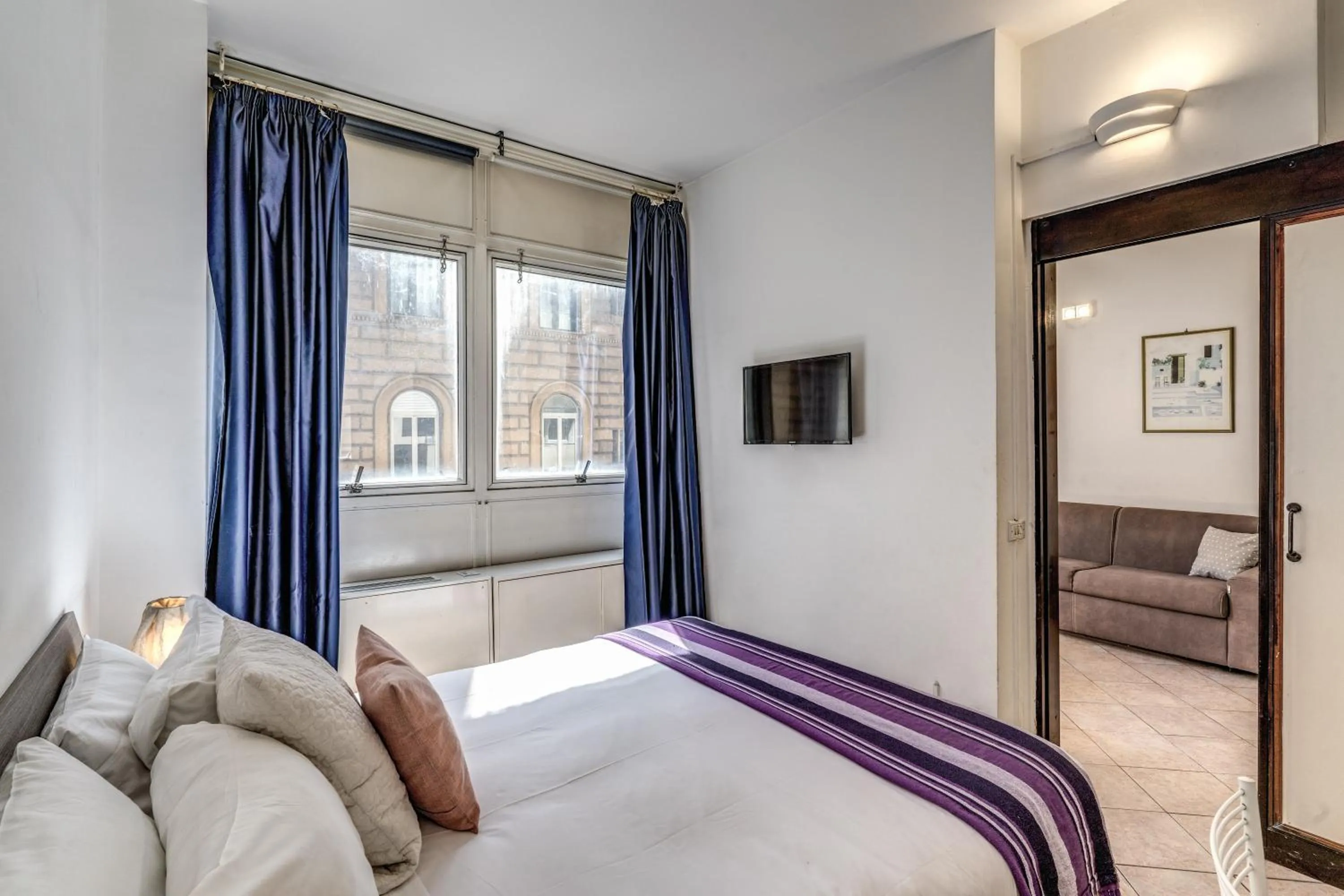 Bed in M&L Apartments - Ardesia Colosseo